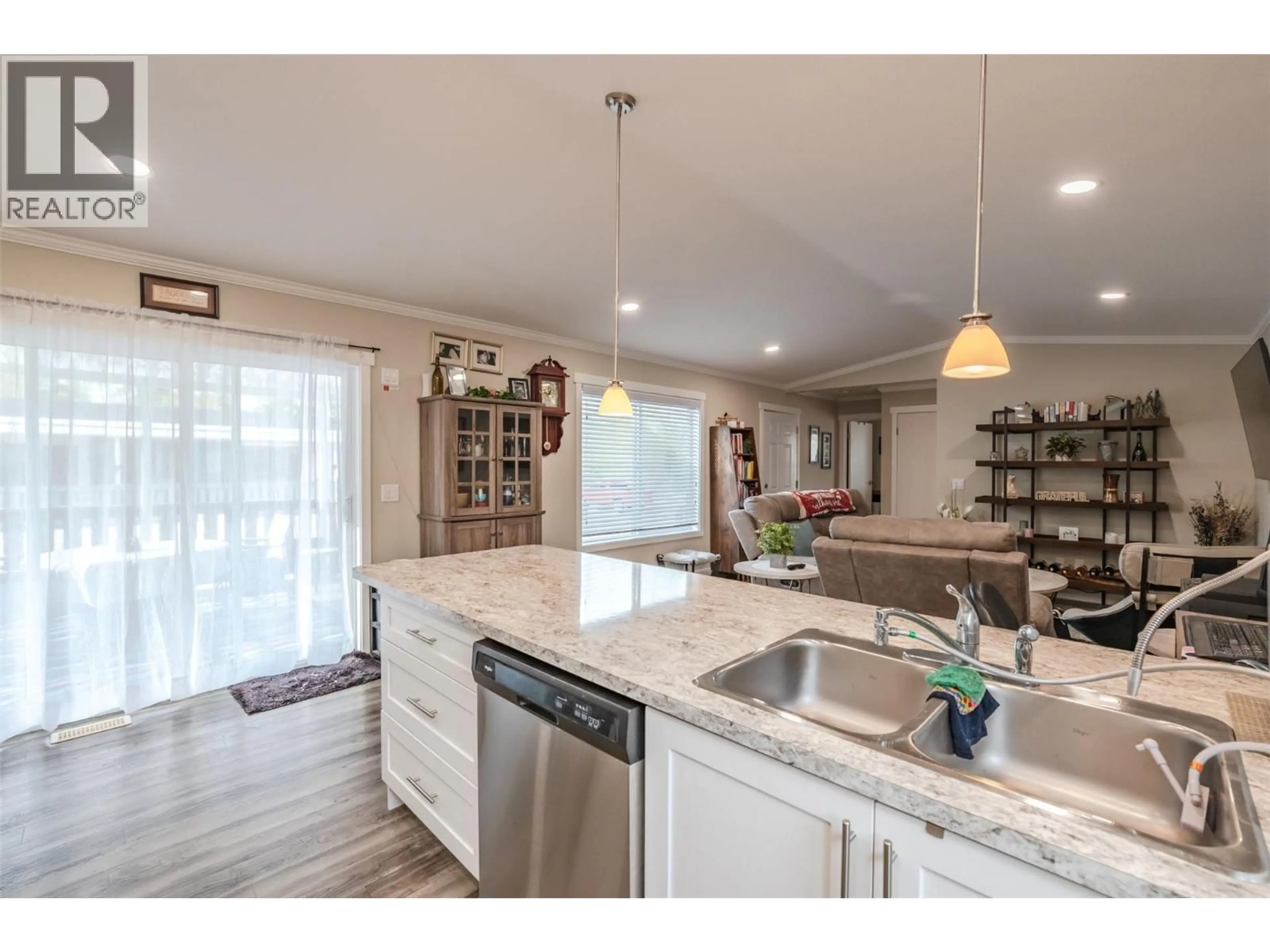 Open concept kitchen, ceramic/tile floor for 102 - 8598 HWY 97 OTHER, Oliver British Columbia V0H1T2