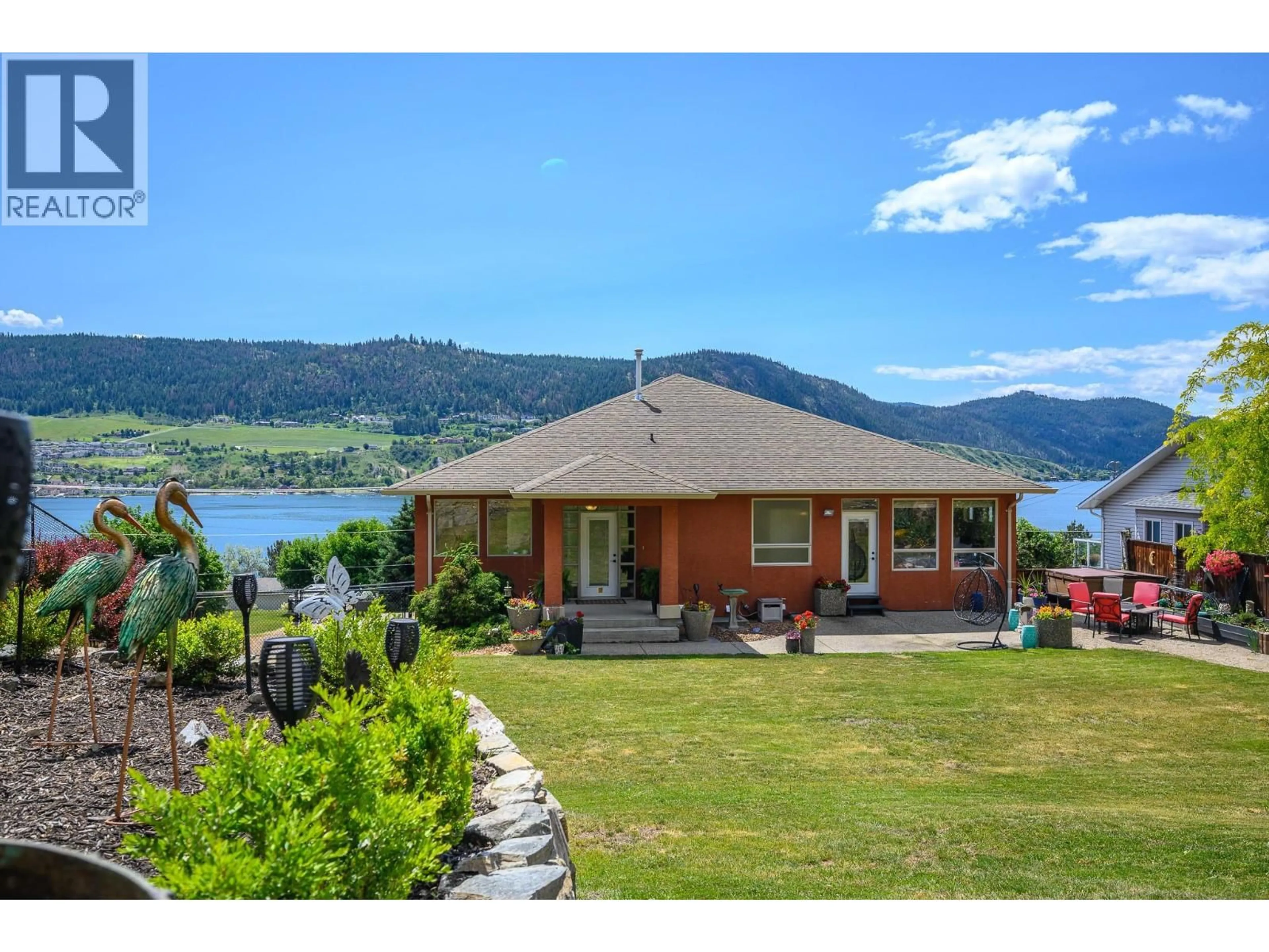 A pic from outside/outdoor area/front of a property/back of a property/a pic from drone, water/lake/river/ocean view for 7551 TRONSON ROAD, Vernon British Columbia V1H1C4