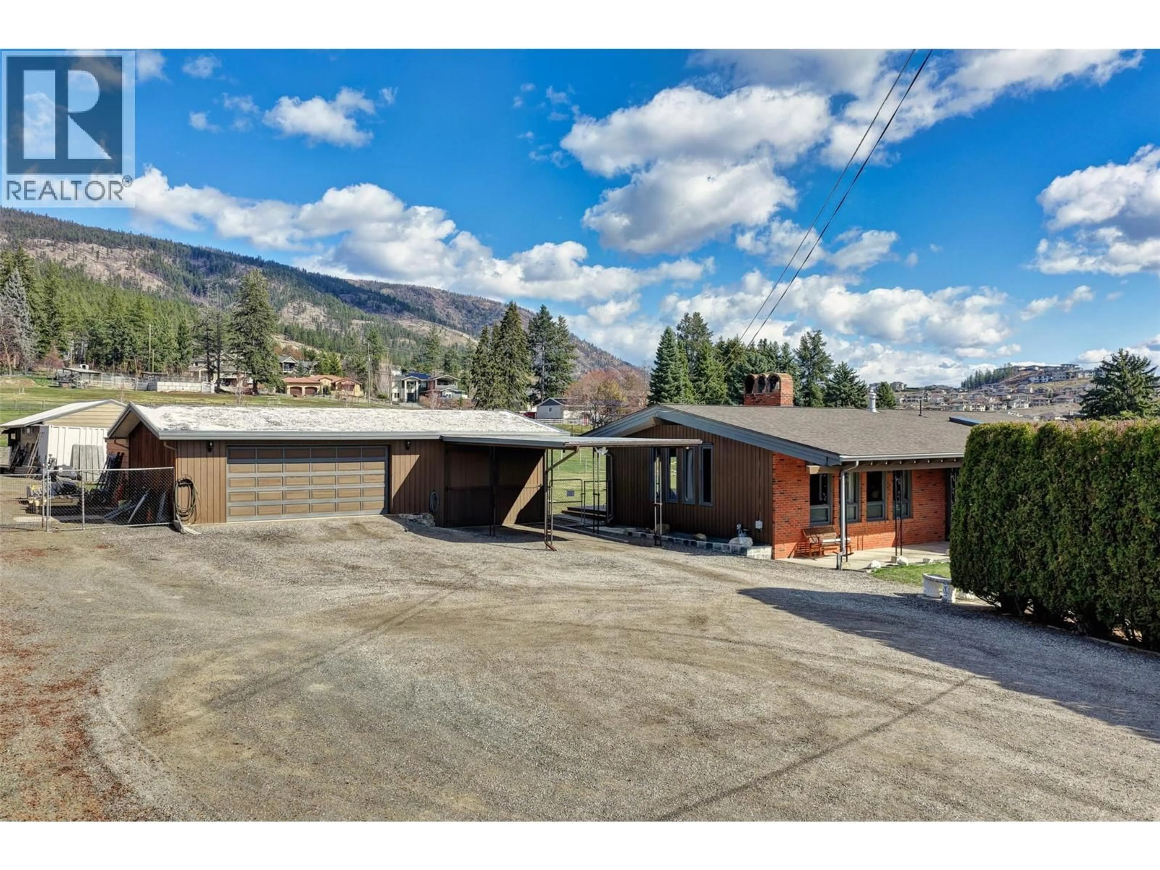 A pic from outside/outdoor area/front of a property/back of a property/a pic from drone, mountain view for 3131 ELLIOTT ROAD, West Kelowna British Columbia V4T1M7