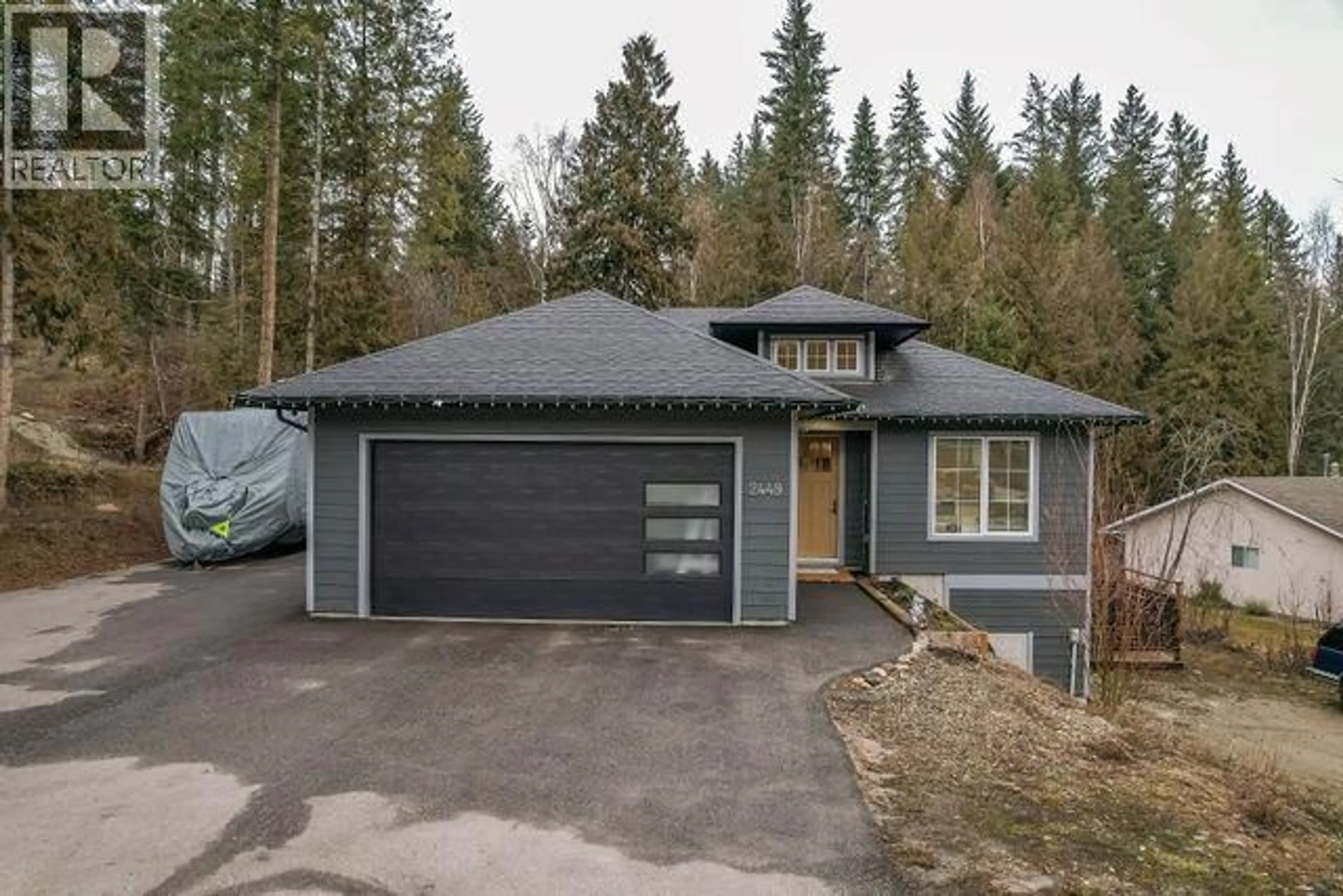 Home with vinyl exterior material, street for 2449 CENTENNIAL DRIVE, Blind Bay British Columbia V0E1H1