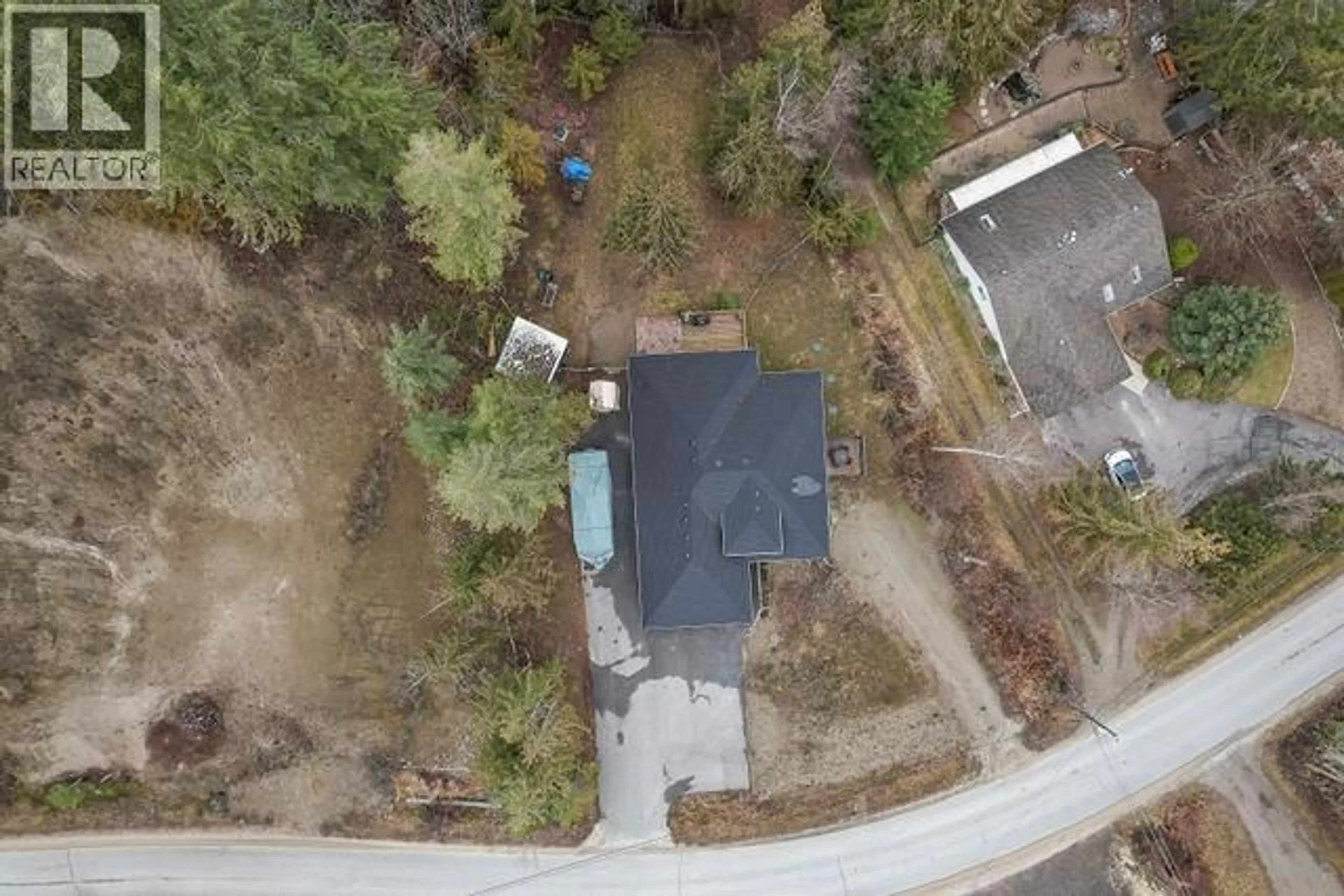 A pic from outside/outdoor area/front of a property/back of a property/a pic from drone, street for 2449 CENTENNIAL DRIVE, Blind Bay British Columbia V0E1H1
