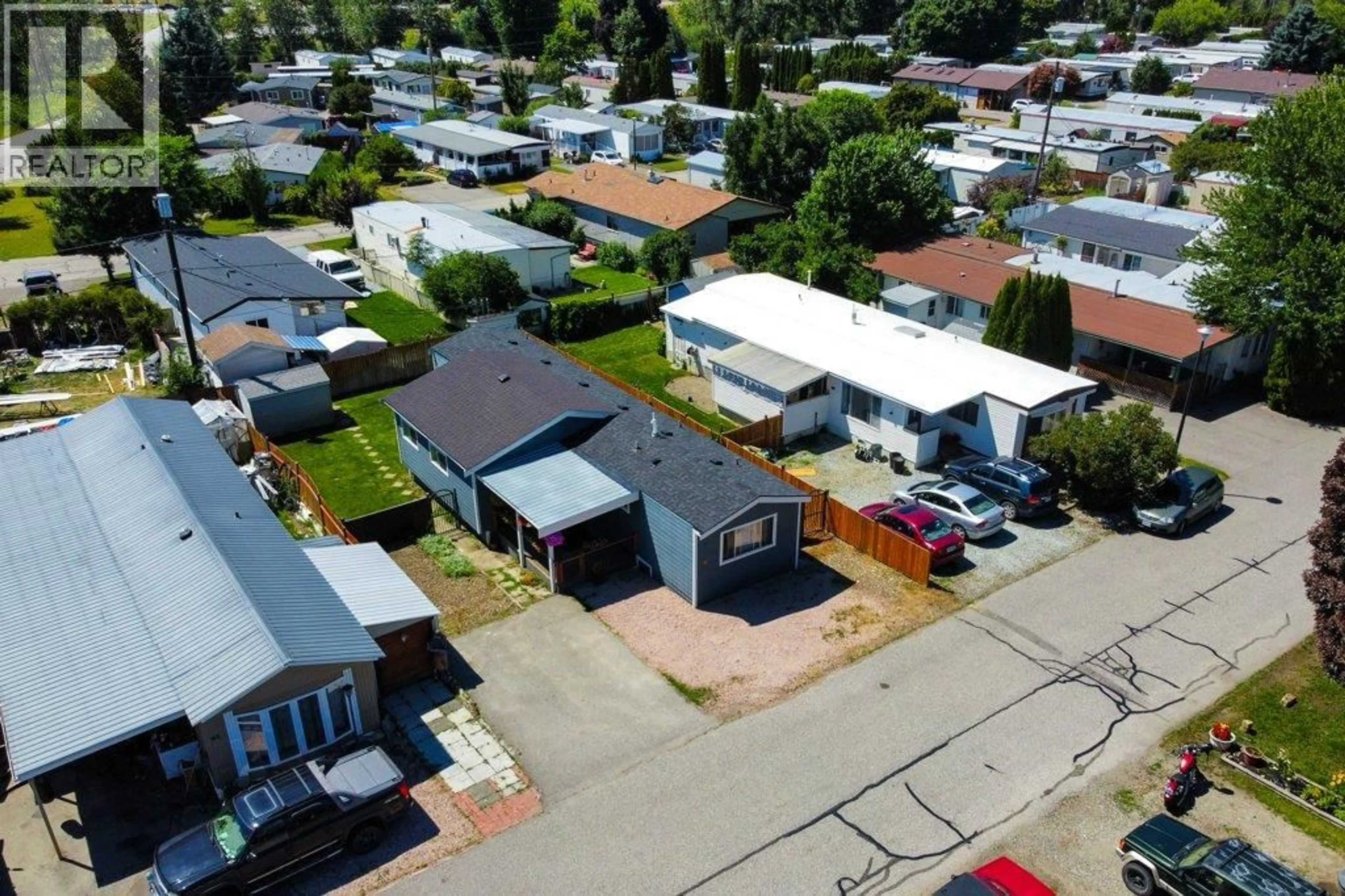 A pic from outside/outdoor area/front of a property/back of a property/a pic from drone, street for 62 - 720 COMMONWEALTH ROAD, Lake Country British Columbia V4V1R6