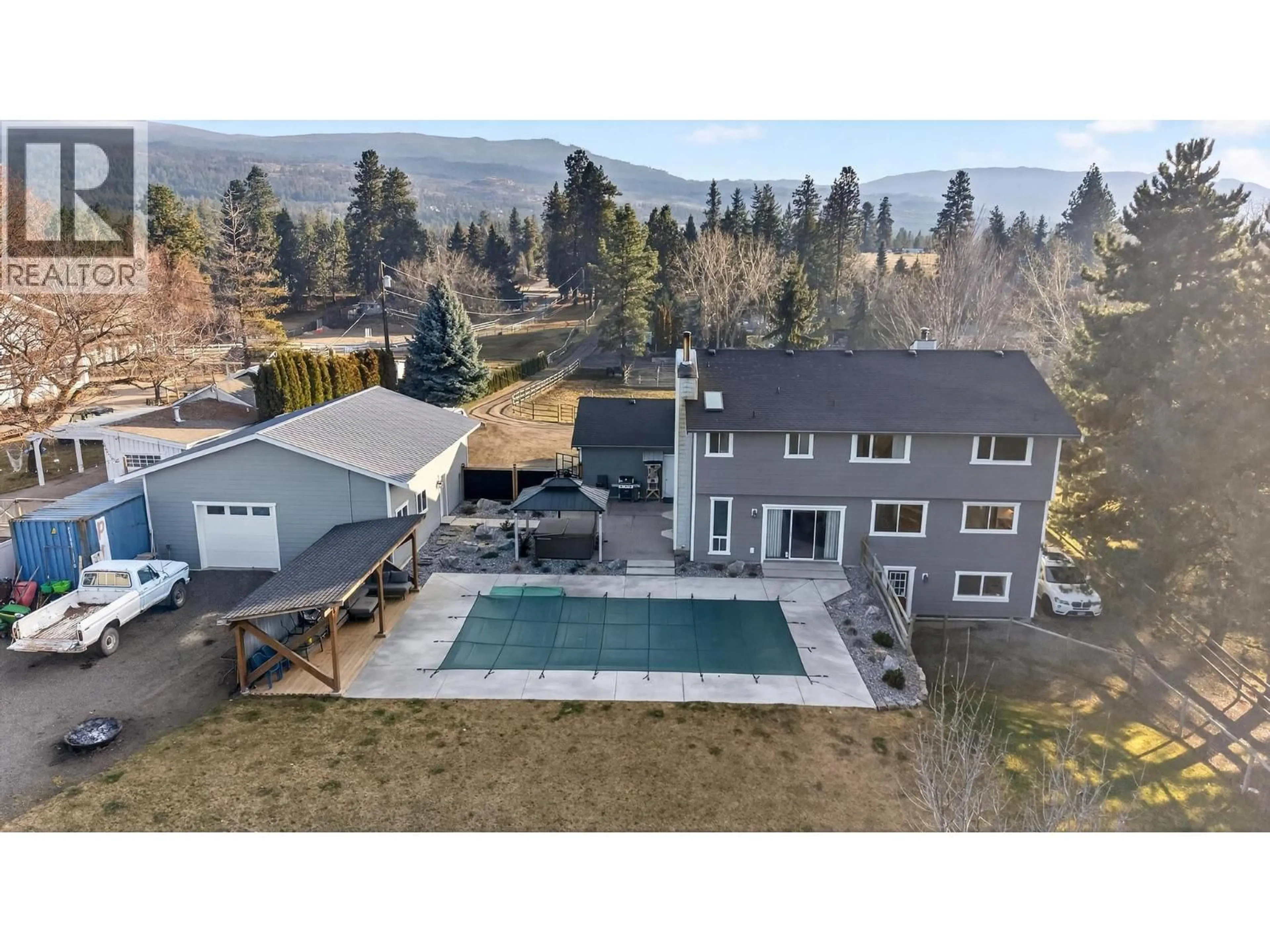 A pic from outside/outdoor area/front of a property/back of a property/a pic from drone, mountain view for 4139 WALLACE HILL ROAD, Kelowna British Columbia V1W4B6