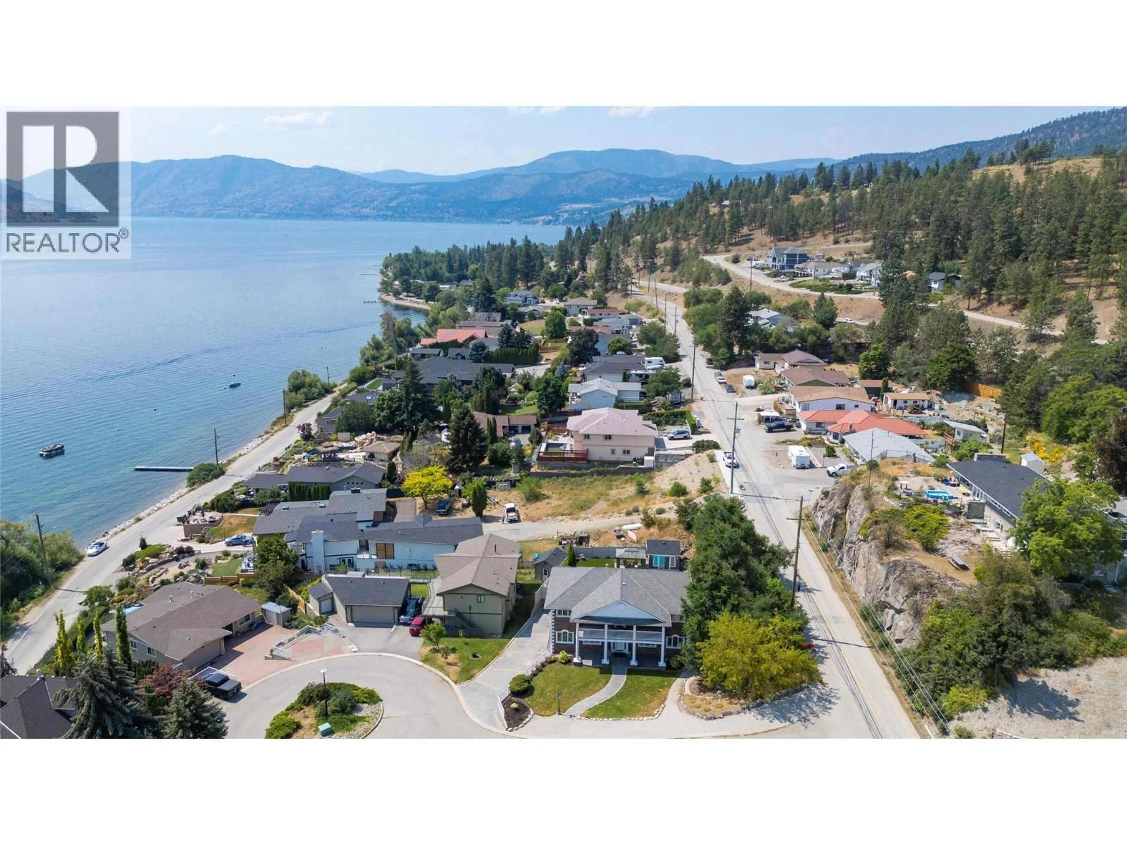 A pic from outside/outdoor area/front of a property/back of a property/a pic from drone, water/lake/river/ocean view for 5318 FULTON PLACE, Peachland British Columbia V0H1X1