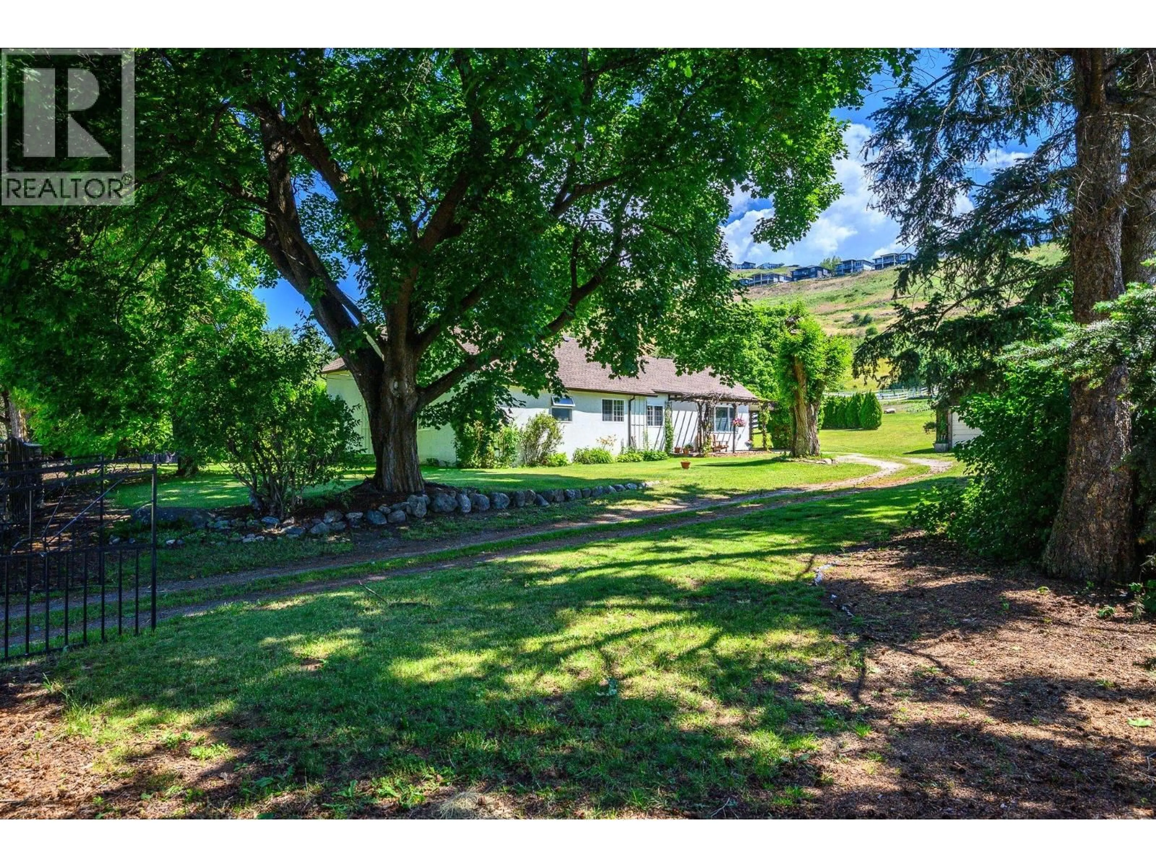 A pic from outside/outdoor area/front of a property/back of a property/a pic from drone, mountain view for 6775 L&A ROAD, Vernon British Columbia V1B3T1