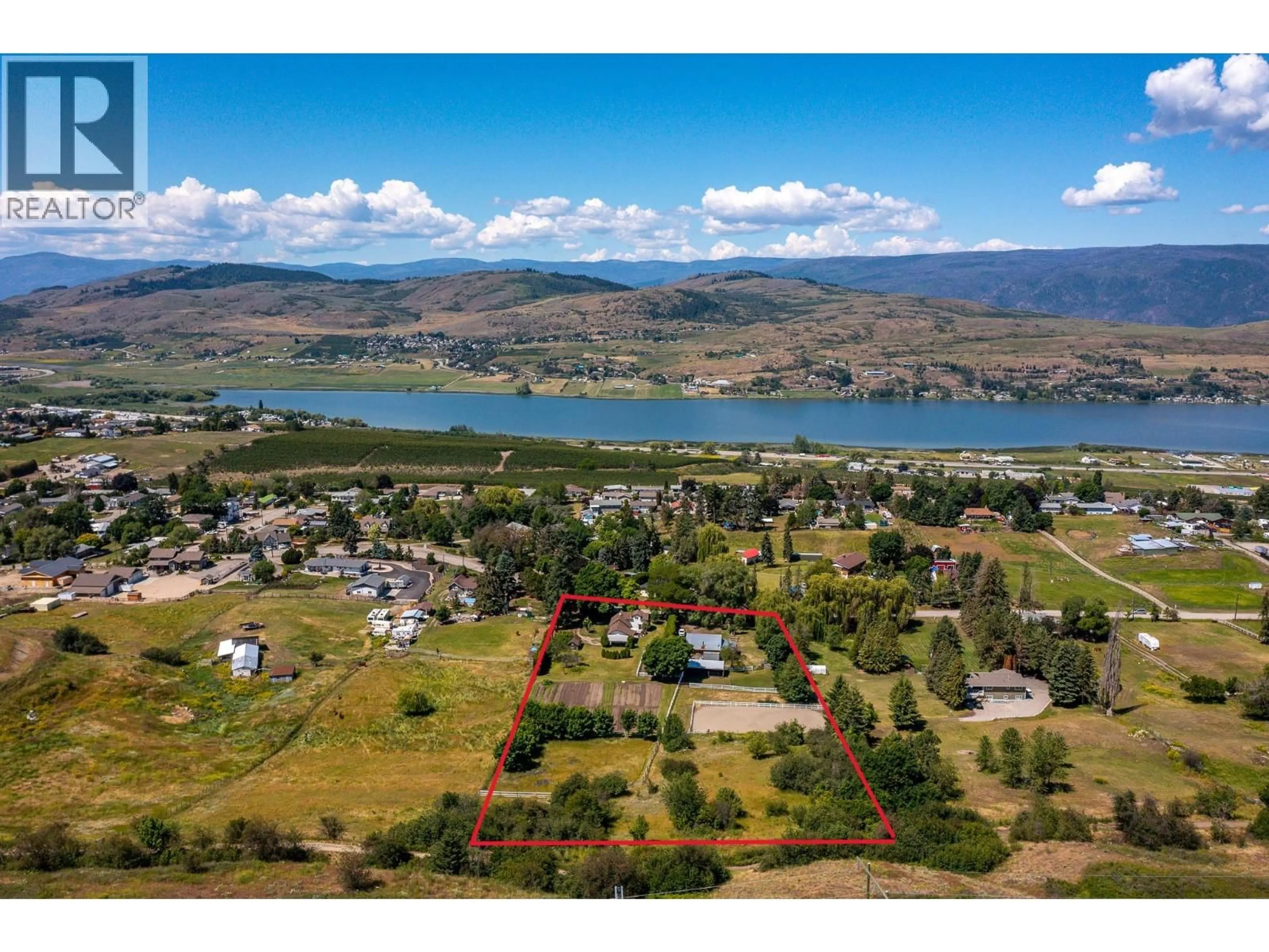 A pic from outside/outdoor area/front of a property/back of a property/a pic from drone, water/lake/river/ocean view for 6775 L&A ROAD, Vernon British Columbia V1B3T1