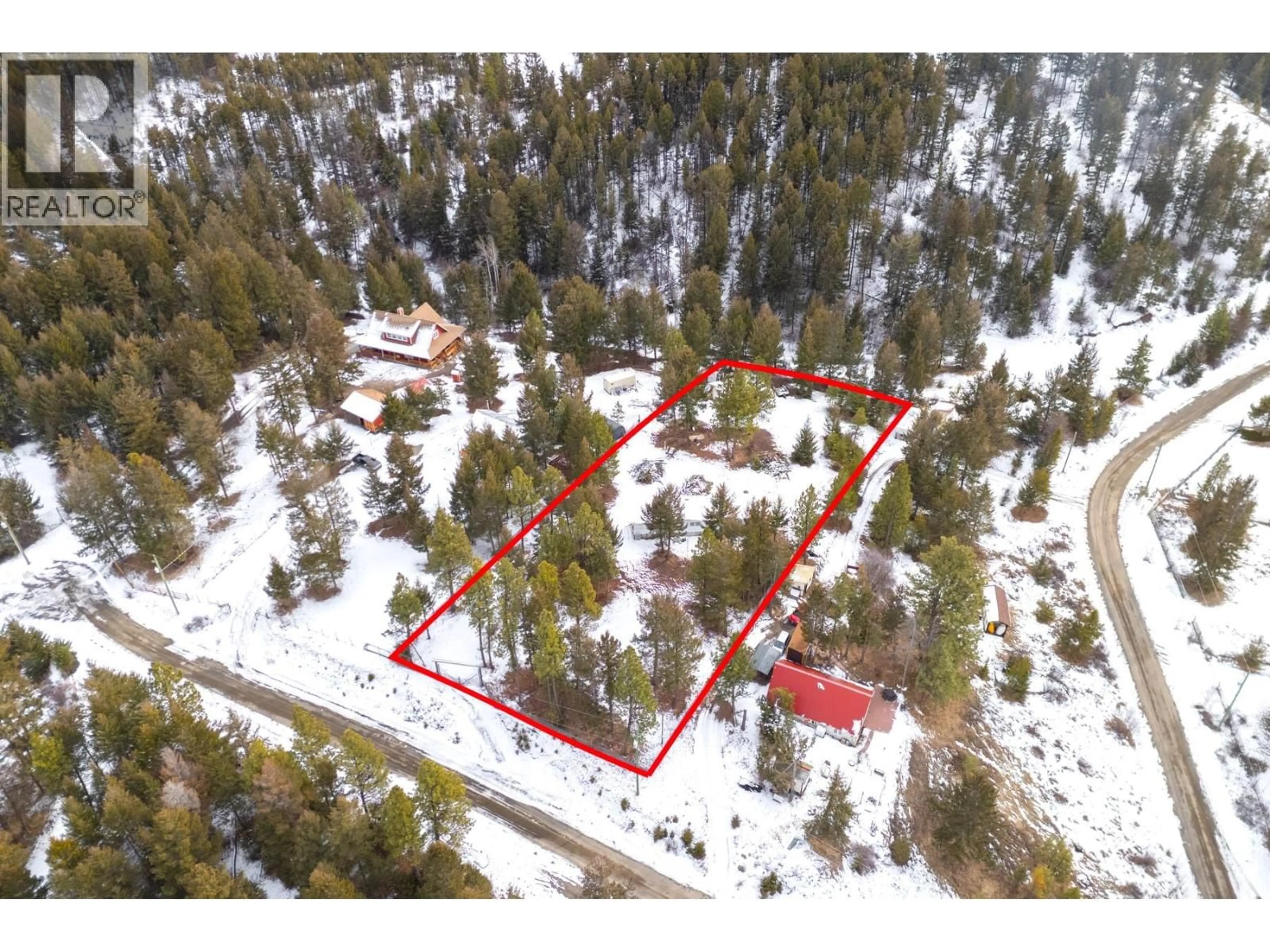 A pic from outside/outdoor area/front of a property/back of a property/a pic from drone, unknown for 589 WILD ROSE DRIVE, Merritt British Columbia V1K1B8
