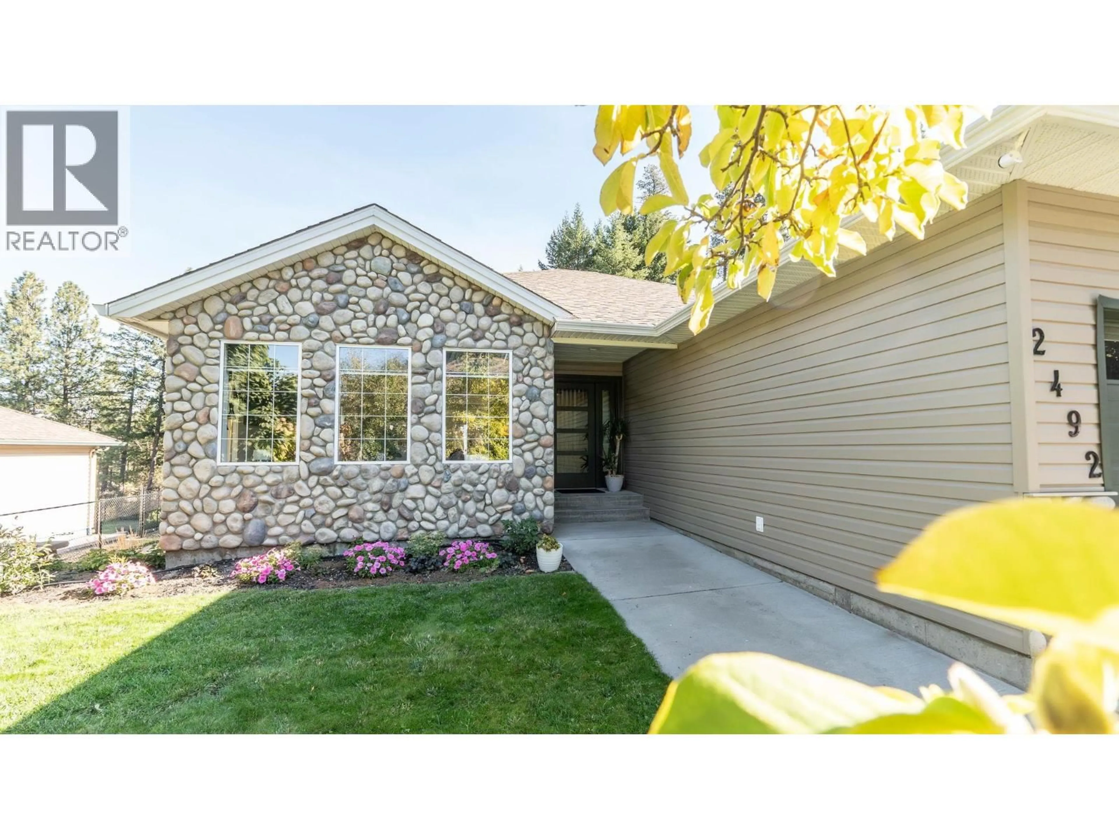 Home with brick exterior material, street for 2492 SHANNON VIEW DRIVE, West Kelowna British Columbia V4T2T3