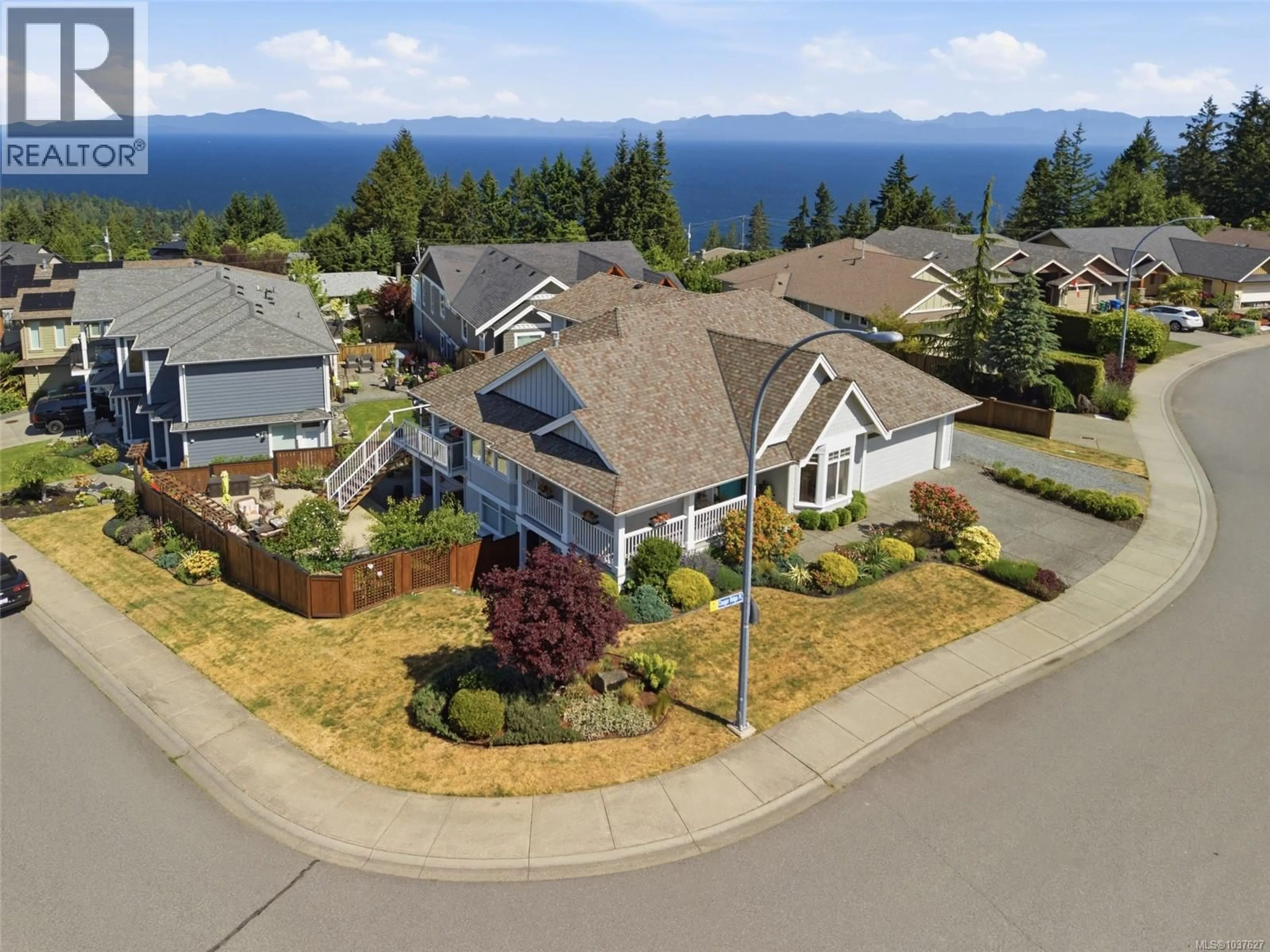 A pic from outside/outdoor area/front of a property/back of a property/a pic from drone, mountain view for 5566 COUGAR RIDGE PLACE, Nanaimo British Columbia V9T5R6