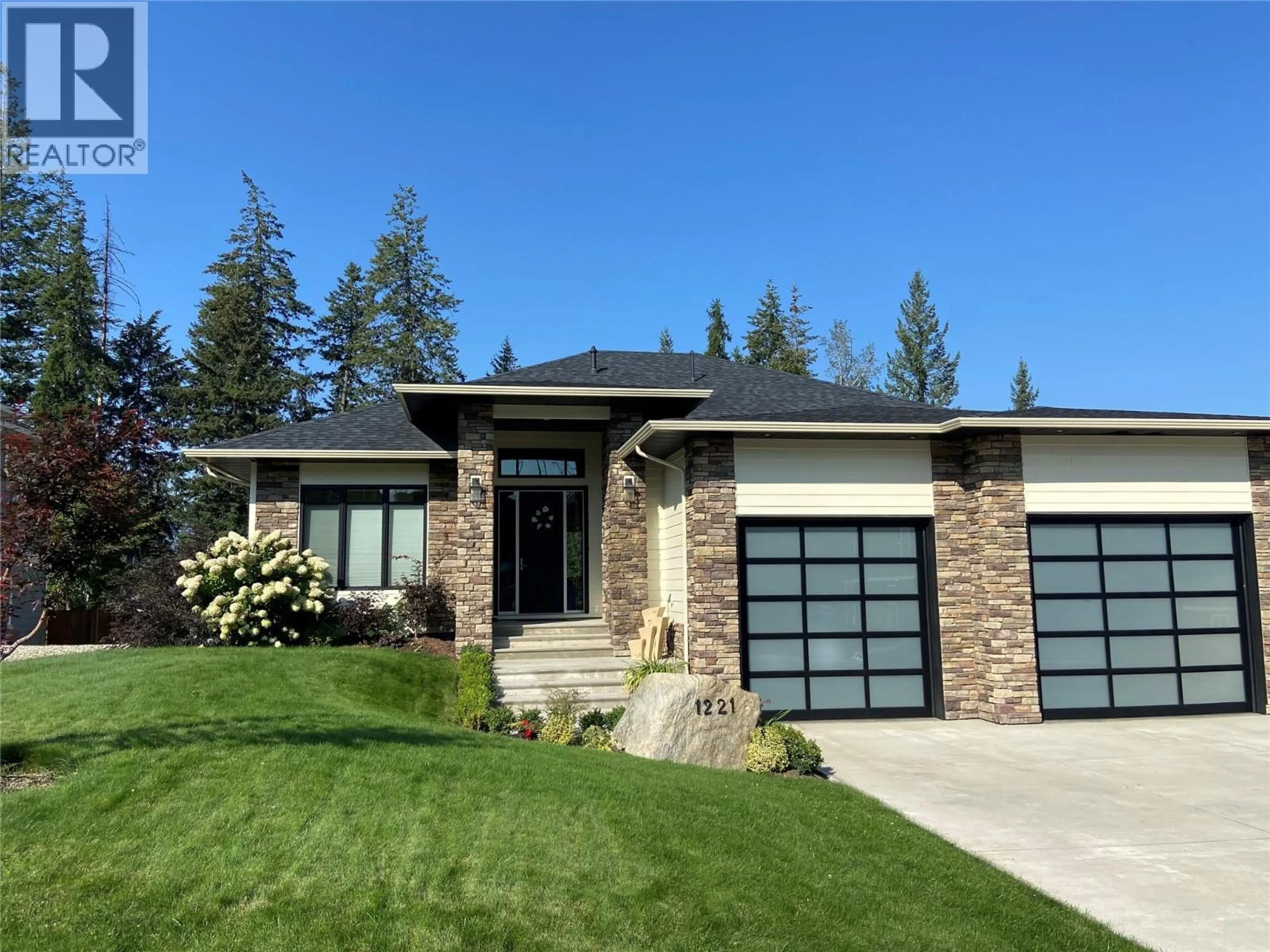 Home with brick exterior material, street for 1221 23 STREET SOUTHEAST, Salmon Arm British Columbia V1E0C7