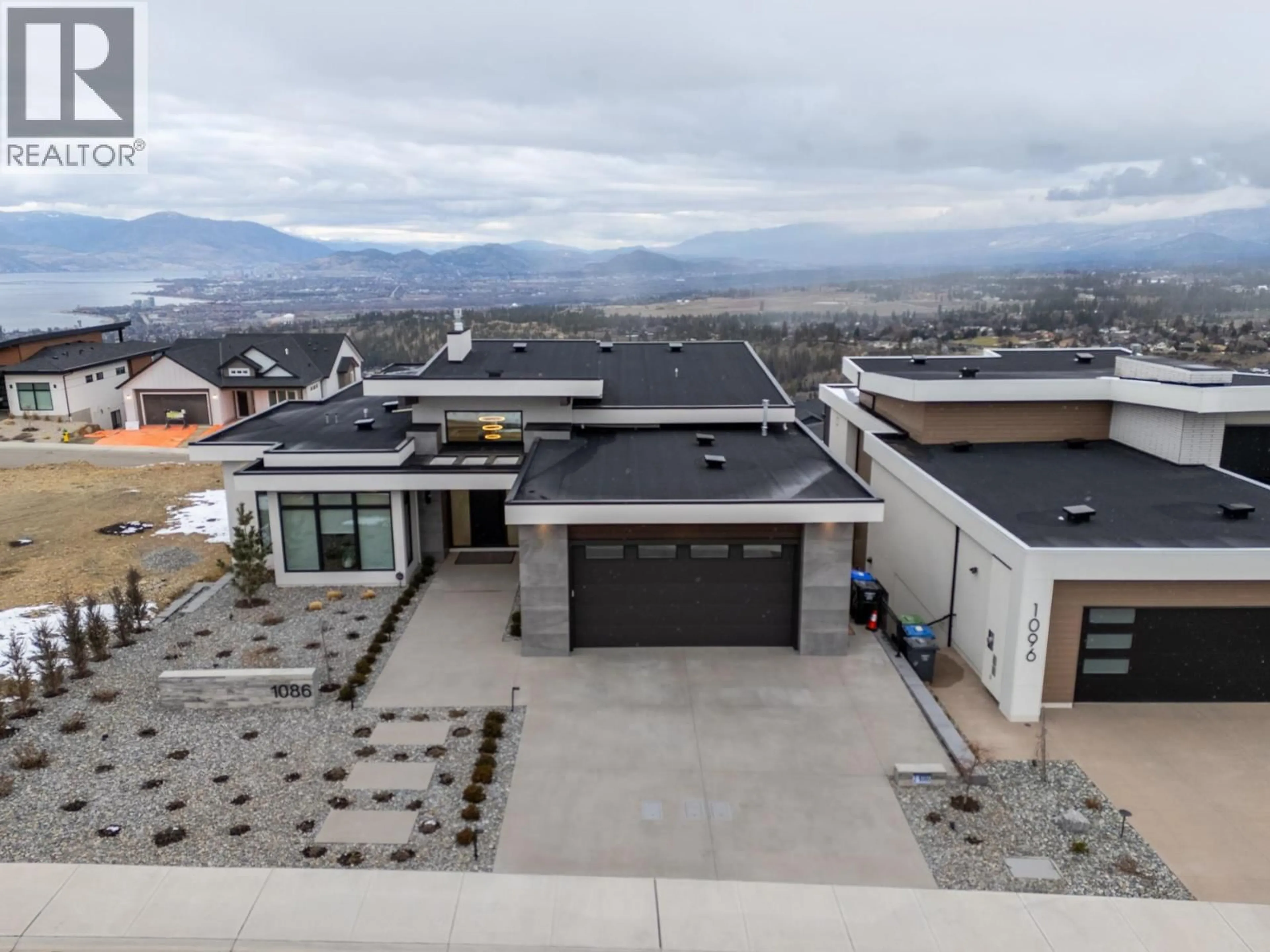 A pic from outside/outdoor area/front of a property/back of a property/a pic from drone, mountain view for 1086 FERGUSON COURT, Kelowna British Columbia V1W5H6