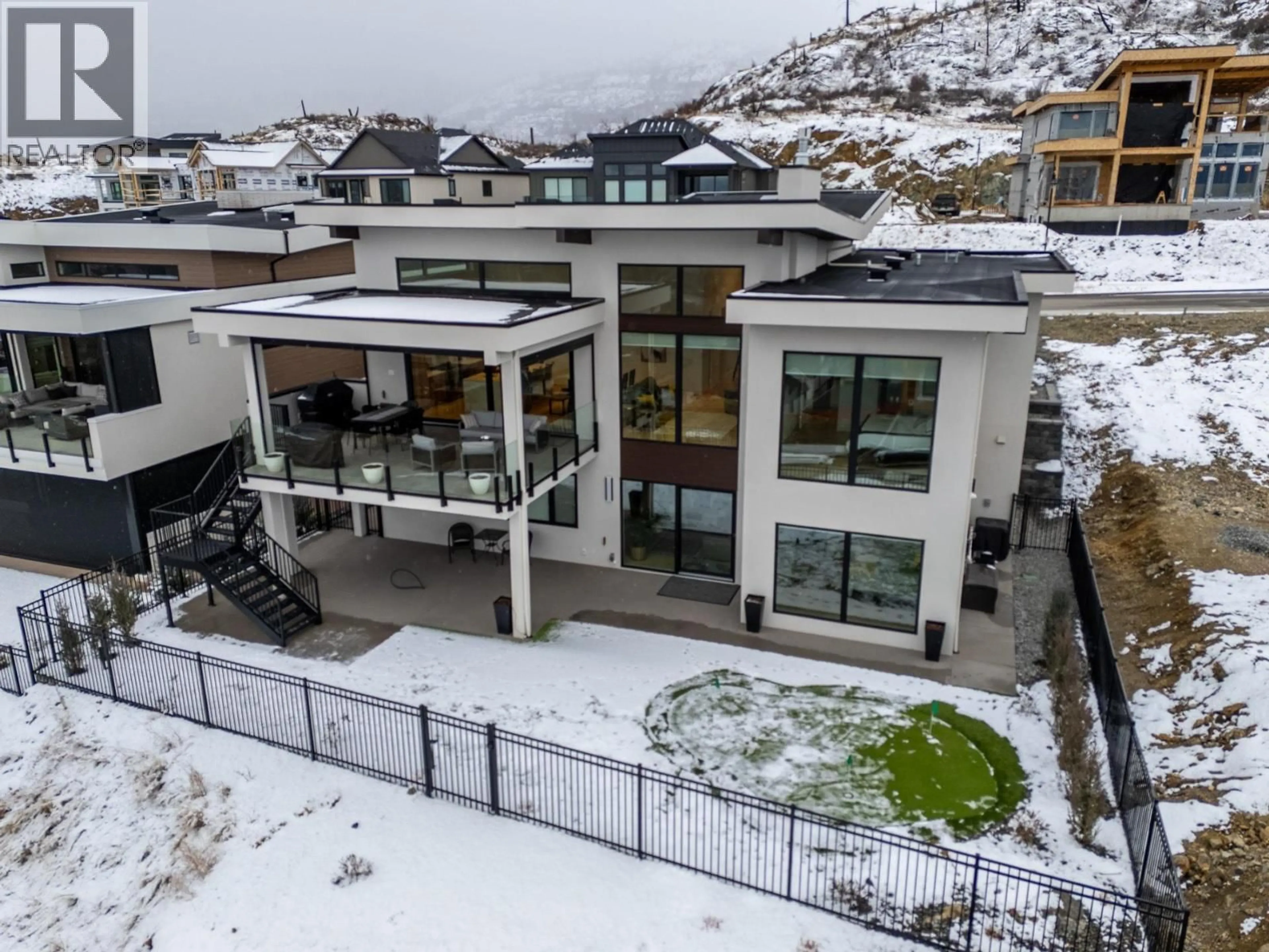 A pic from outside/outdoor area/front of a property/back of a property/a pic from drone, mountain view for 1086 FERGUSON COURT, Kelowna British Columbia V1W5H6