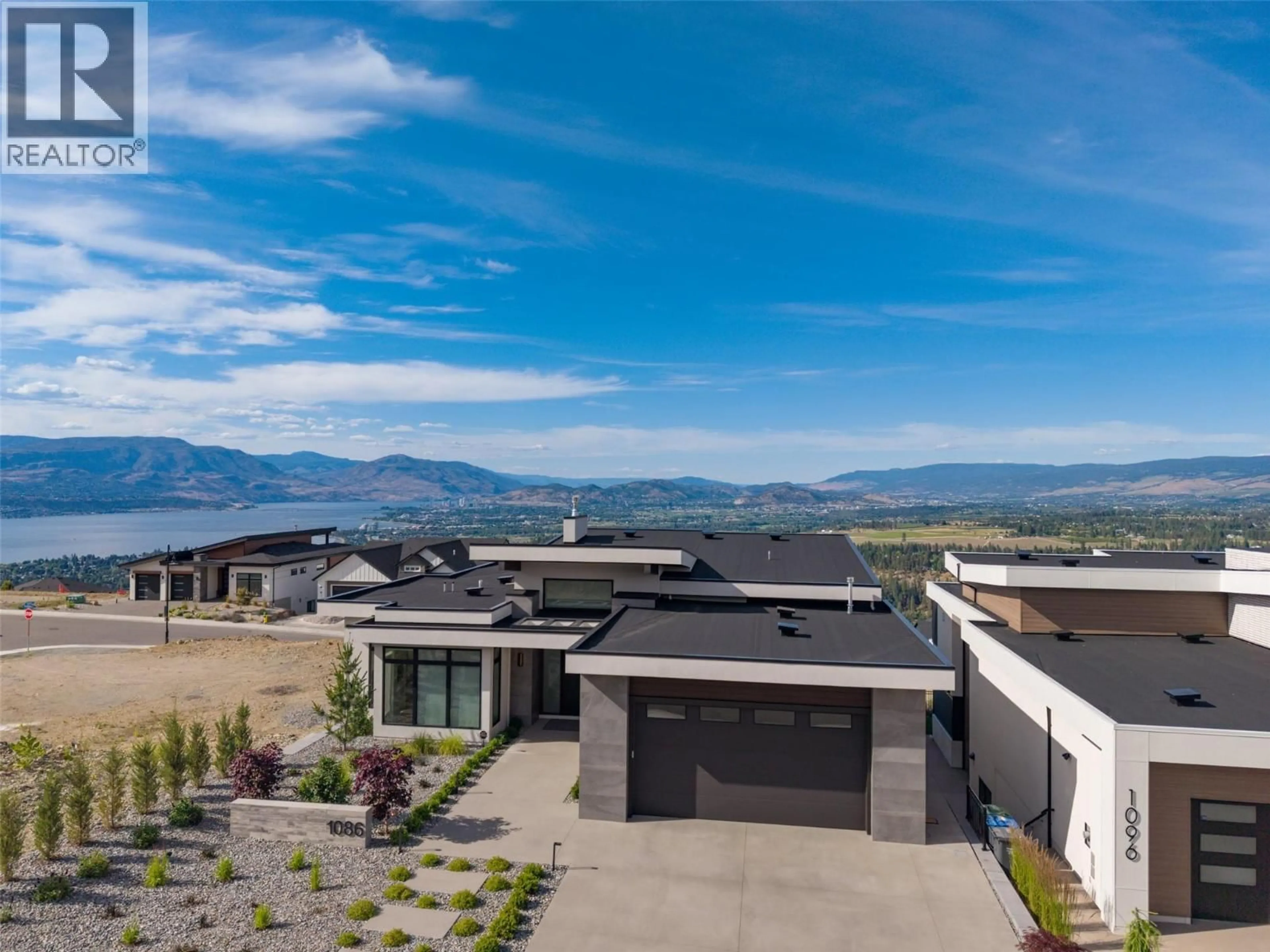 A pic from outside/outdoor area/front of a property/back of a property/a pic from drone, mountain view for 1086 FERGUSON COURT, Kelowna British Columbia V1W5H6