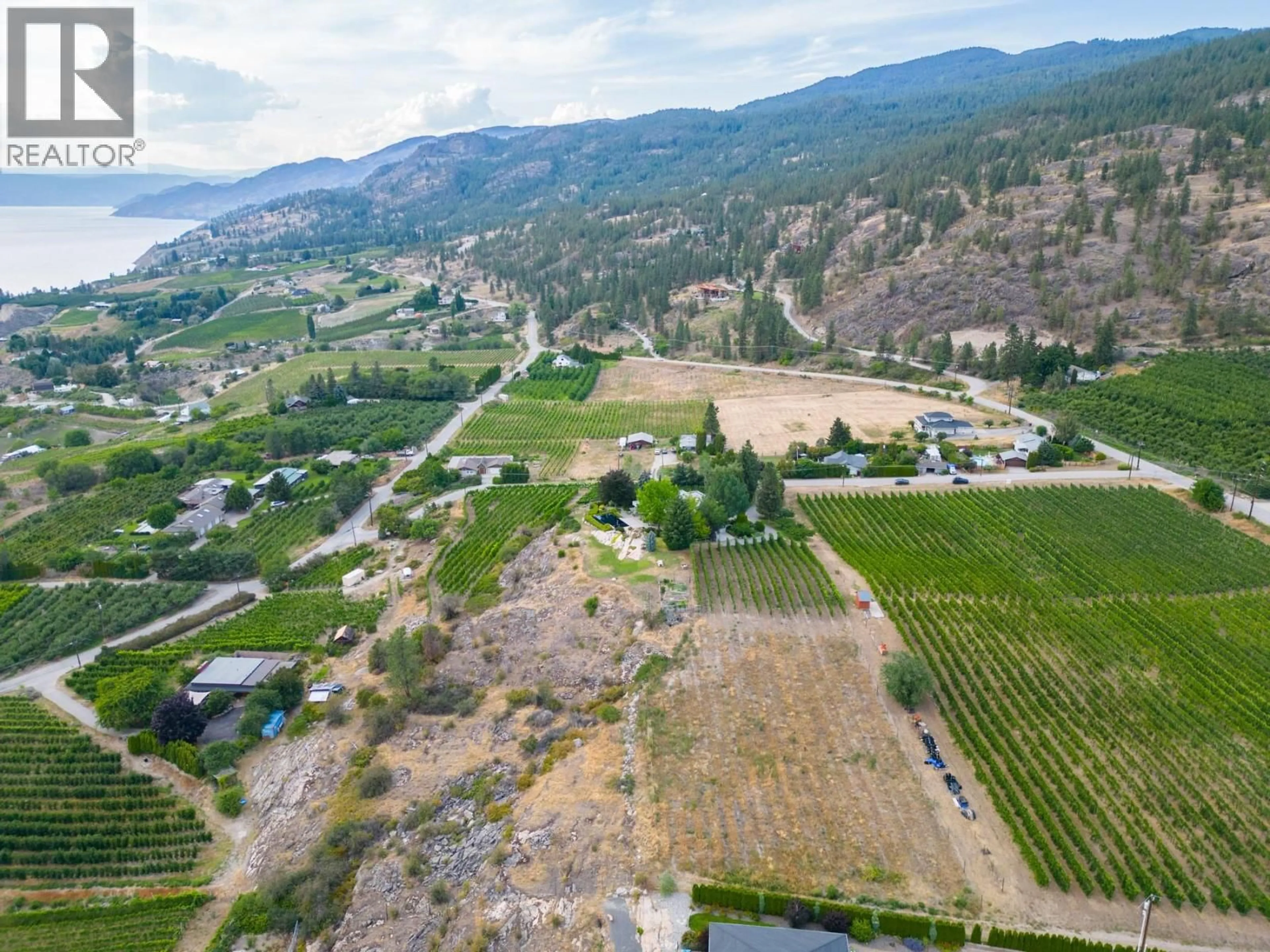 A pic from outside/outdoor area/front of a property/back of a property/a pic from drone, mountain view for 1030 KING DRIVE, Naramata British Columbia V0H1N1