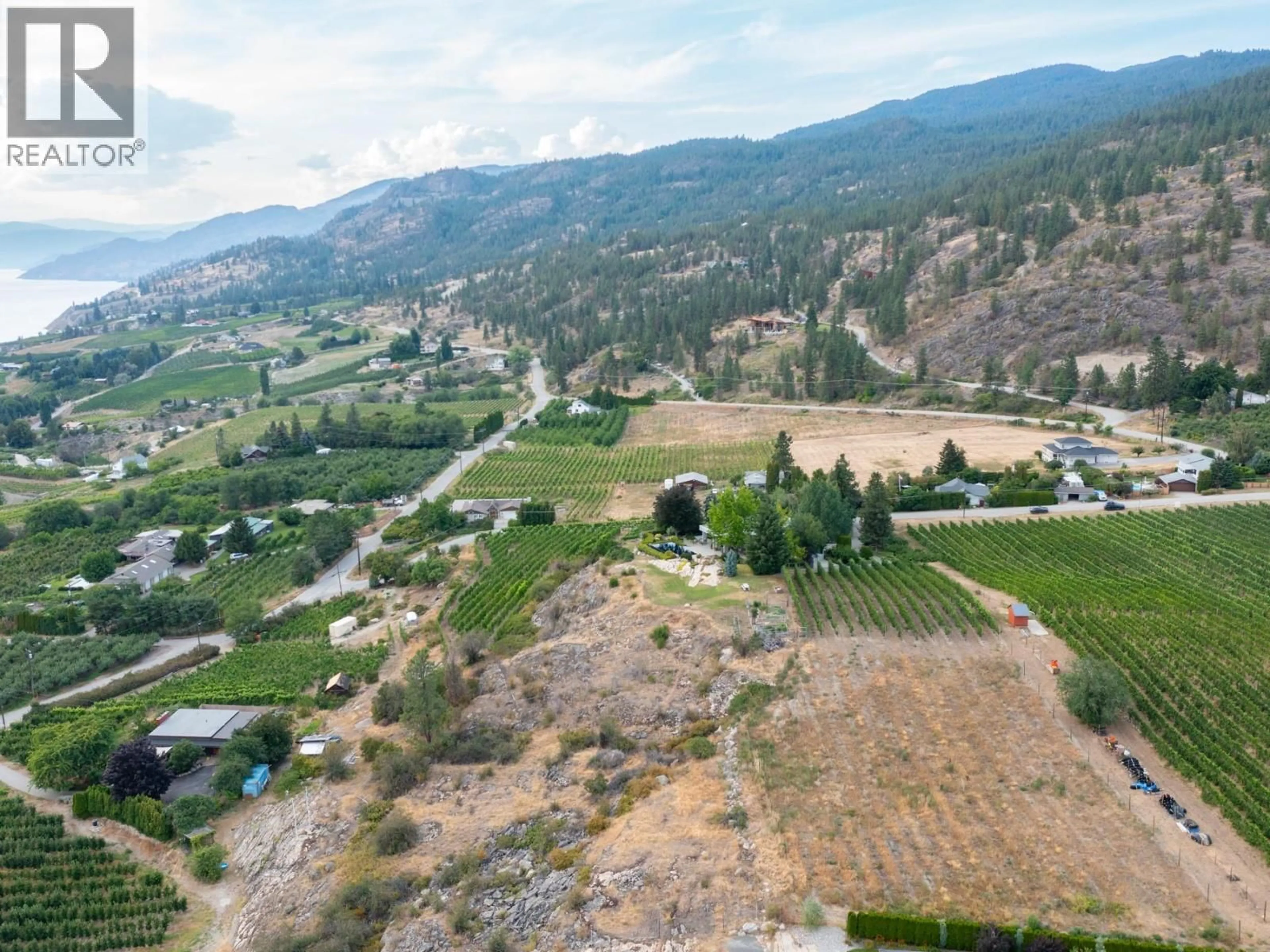 A pic from outside/outdoor area/front of a property/back of a property/a pic from drone, mountain view for 1030 KING DRIVE, Naramata British Columbia V0H1N1