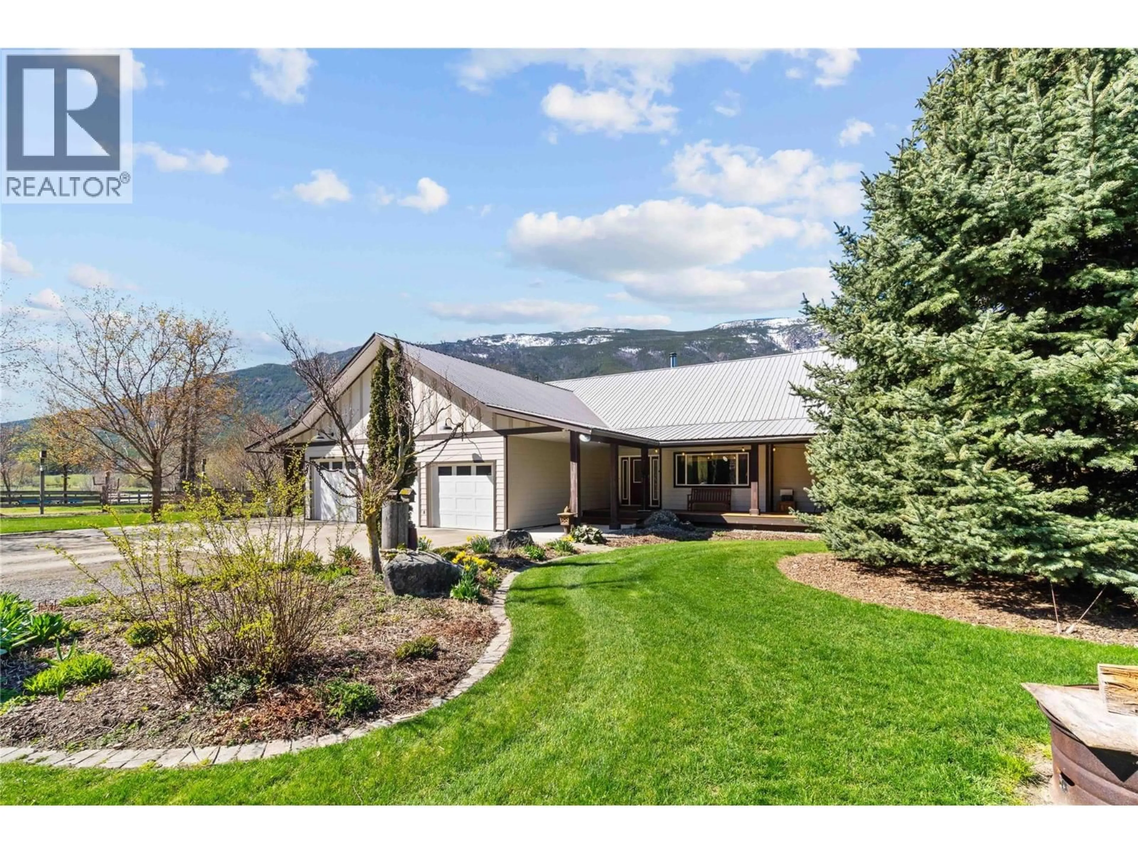 A pic from outside/outdoor area/front of a property/back of a property/a pic from drone, mountain view for 152 SALMON RIVER ROAD, Salmon Arm British Columbia V1E3E3