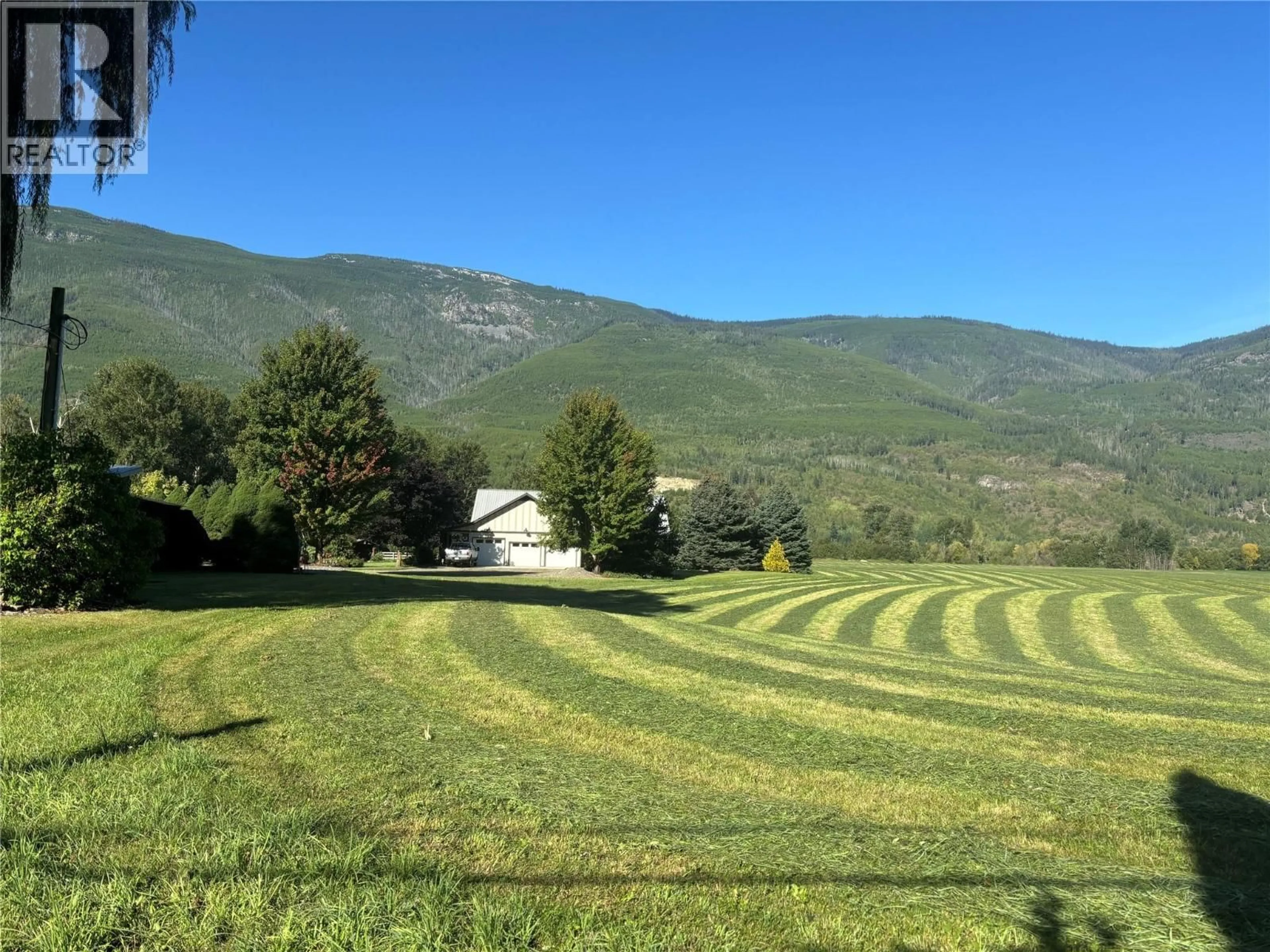 A pic from outside/outdoor area/front of a property/back of a property/a pic from drone, mountain view for 152 SALMON RIVER ROAD, Salmon Arm British Columbia V1E3E3