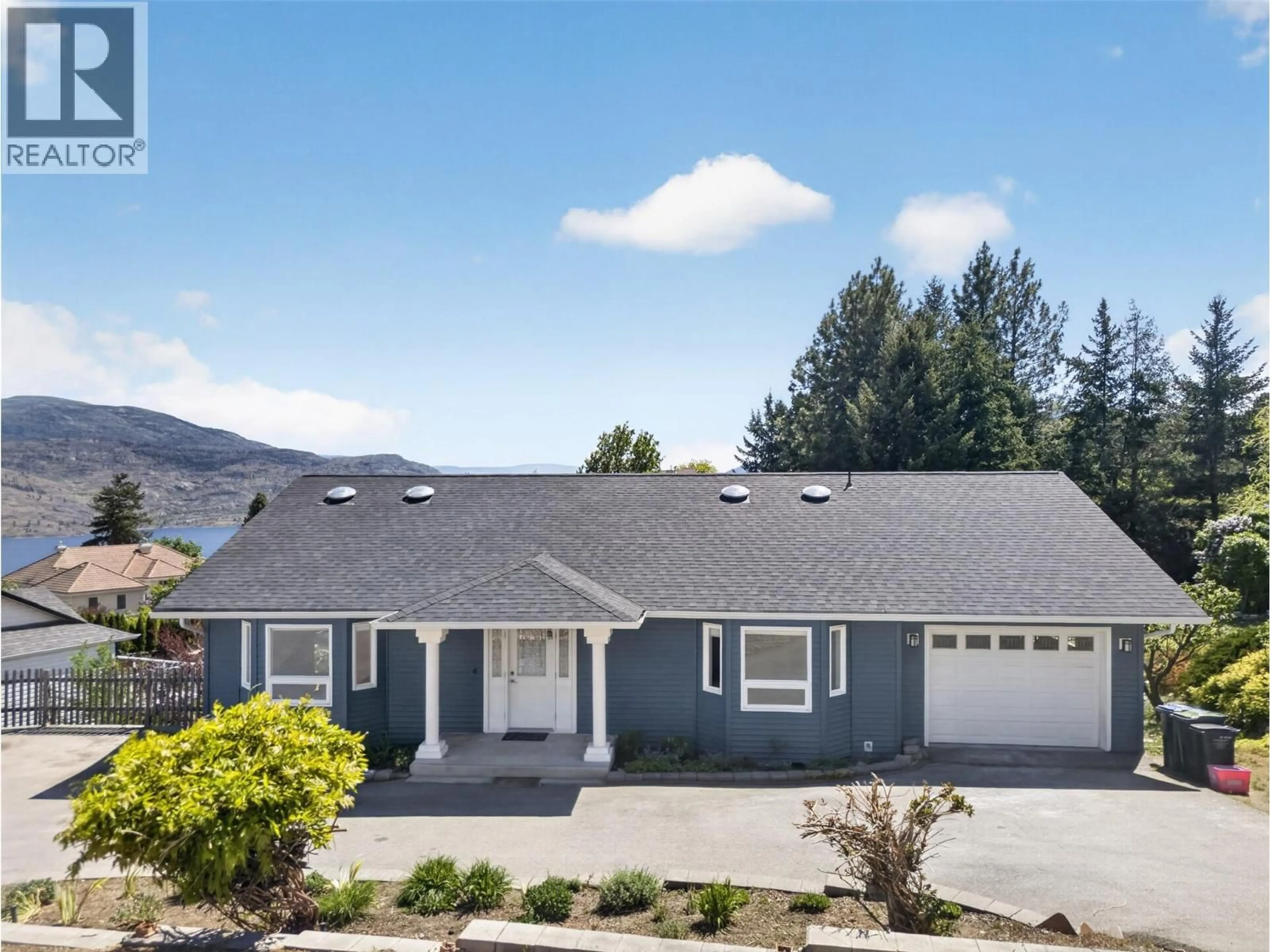 Home with vinyl exterior material, mountain view for 4739 PEACHLAND PLACE, Peachland British Columbia V0H1X4