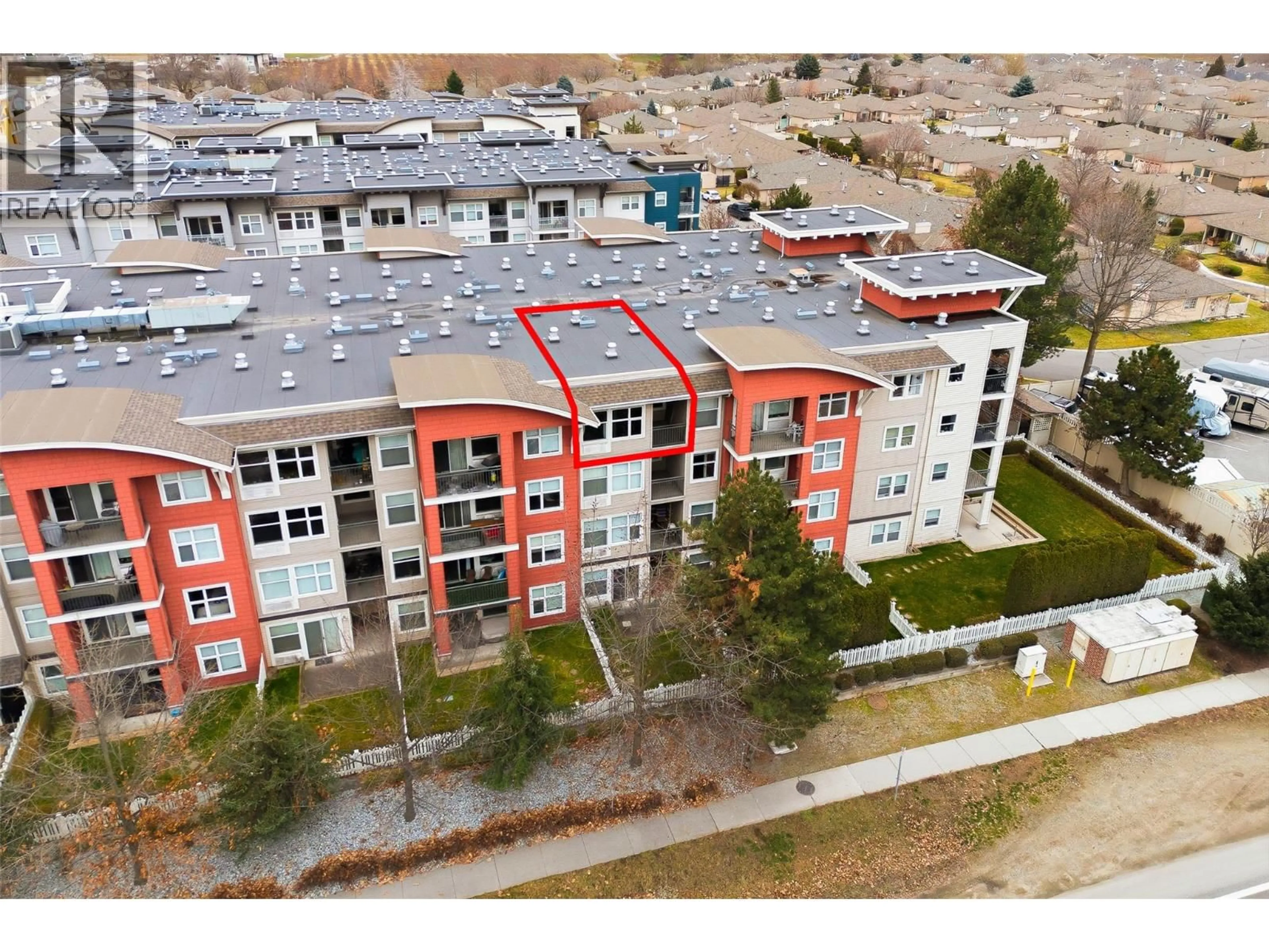 A pic from outside/outdoor area/front of a property/back of a property/a pic from drone, unknown for 410 - 555 YATES ROAD, Kelowna British Columbia V1V2V2