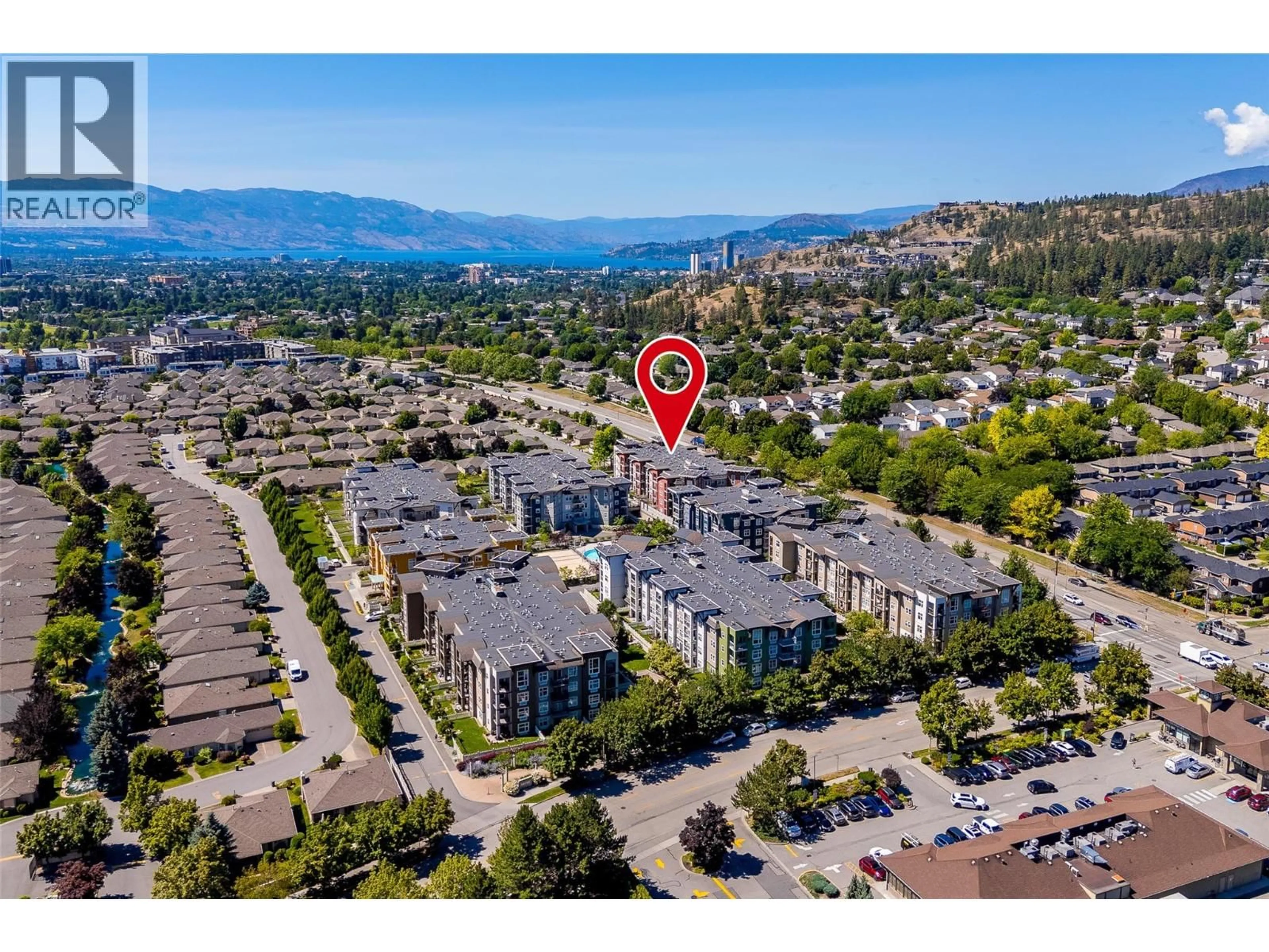 A pic from outside/outdoor area/front of a property/back of a property/a pic from drone, mountain view for 410 - 555 YATES ROAD, Kelowna British Columbia V1V2V2