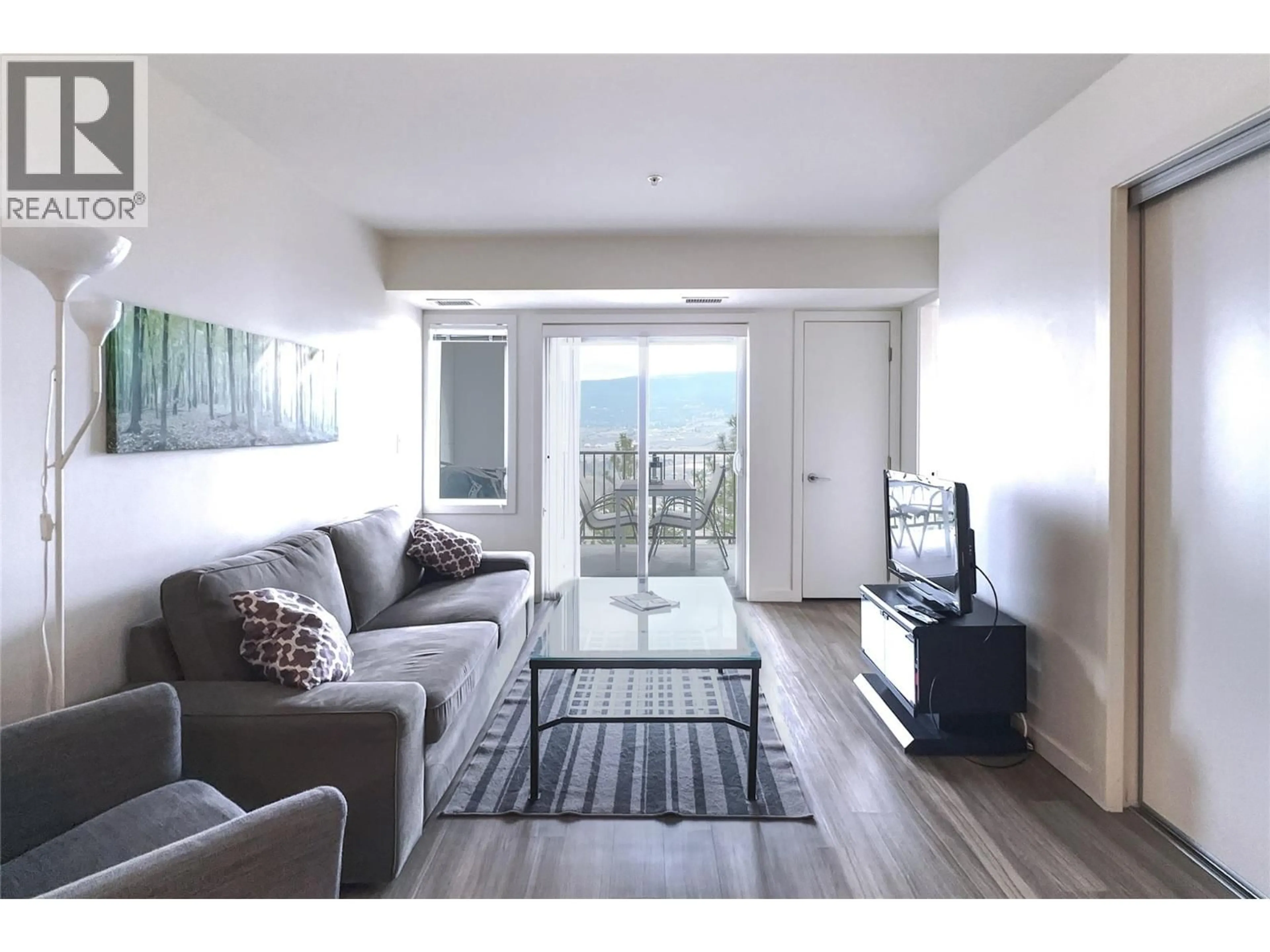 Living room with furniture, unknown for 218 - 775 ACADEMY WAY, Kelowna British Columbia V1V0A5