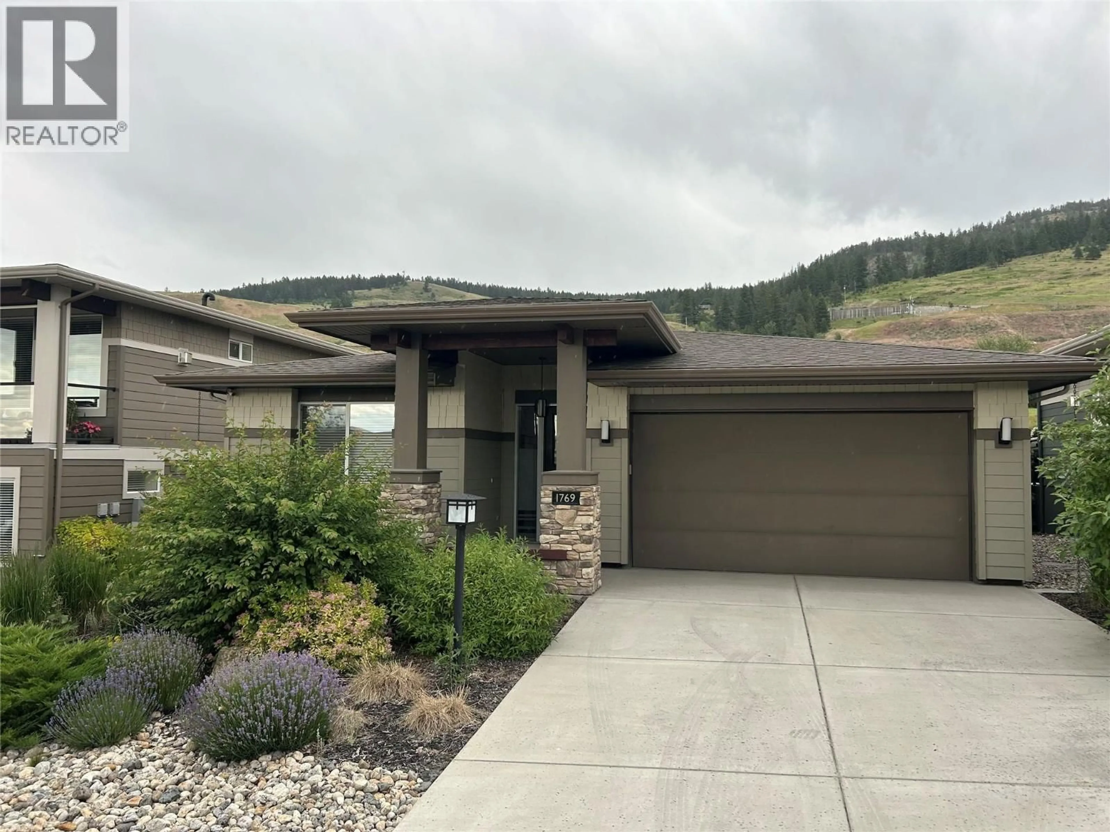 Home with vinyl exterior material, mountain view for 1769 TOWER RANCH DRIVE, Kelowna British Columbia V1P1T2