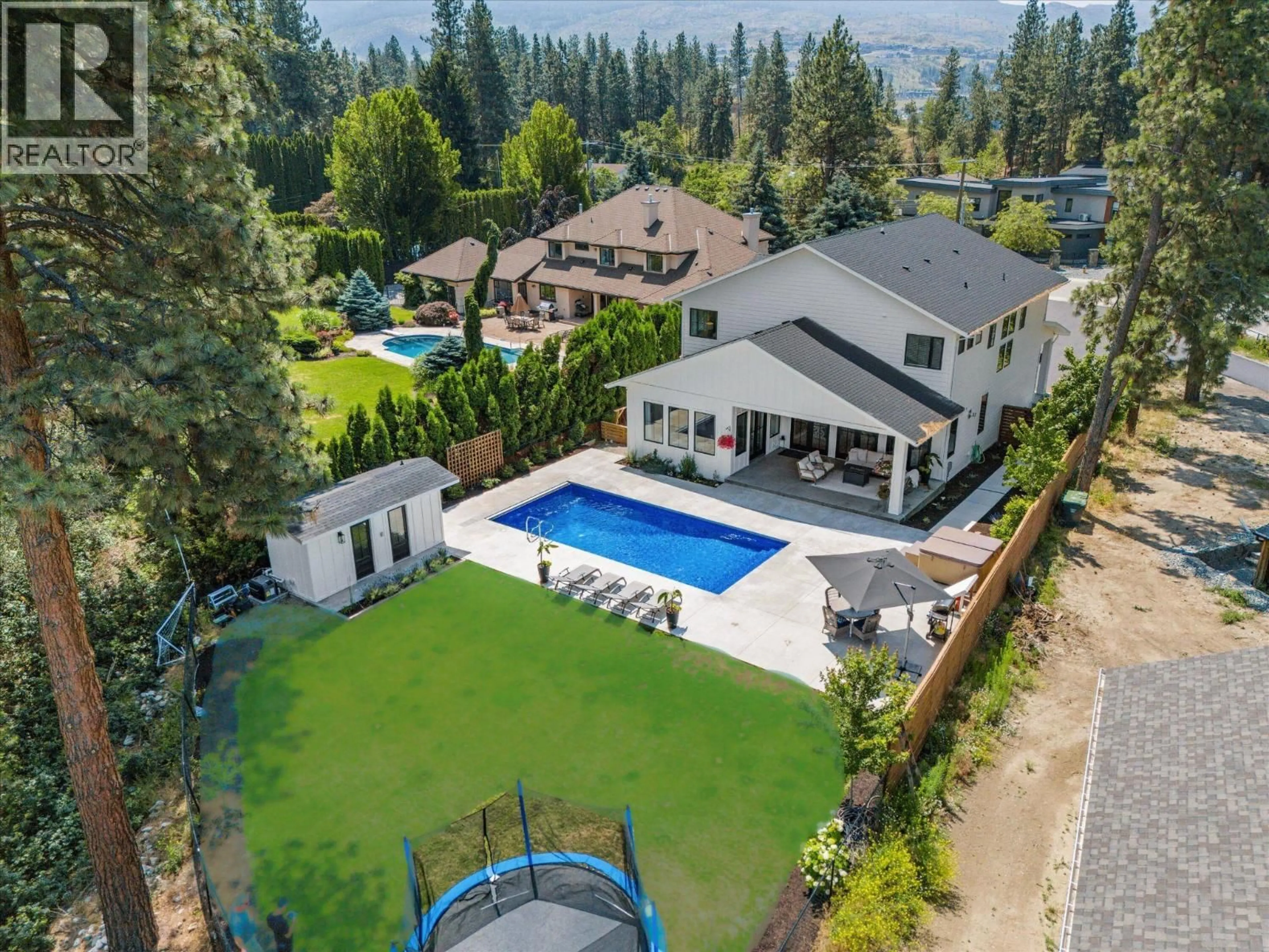 A pic from outside/outdoor area/front of a property/back of a property/a pic from drone, mountain view for 1180 MISSION RIDGE ROAD, Kelowna British Columbia V1W3B2