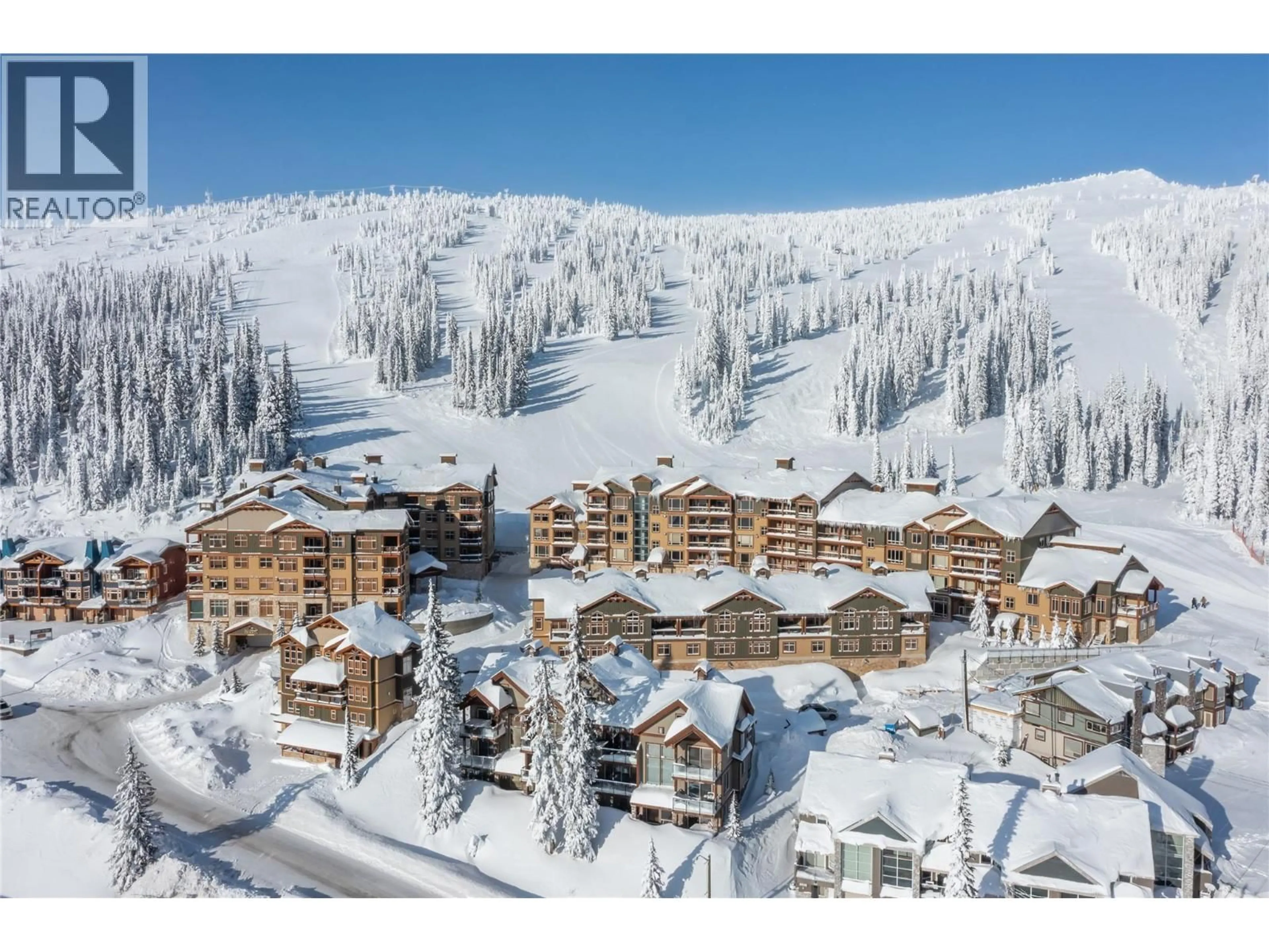 A pic from outside/outdoor area/front of a property/back of a property/a pic from drone, mountain view for 3-104 - 7700 PORCUPINE ROAD, Big White British Columbia V1P1P3