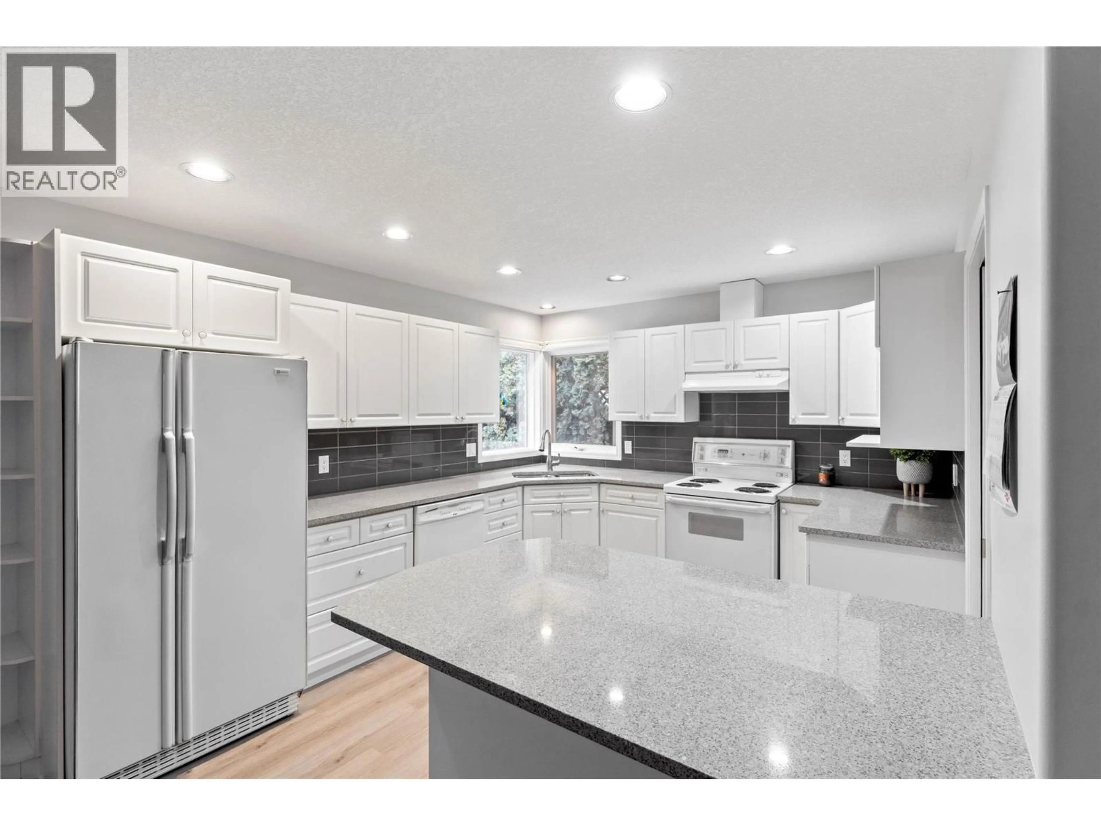 Open concept kitchen, ceramic/tile floor for 1869 MCKINLEY COURT, Kamloops British Columbia V2E2L9