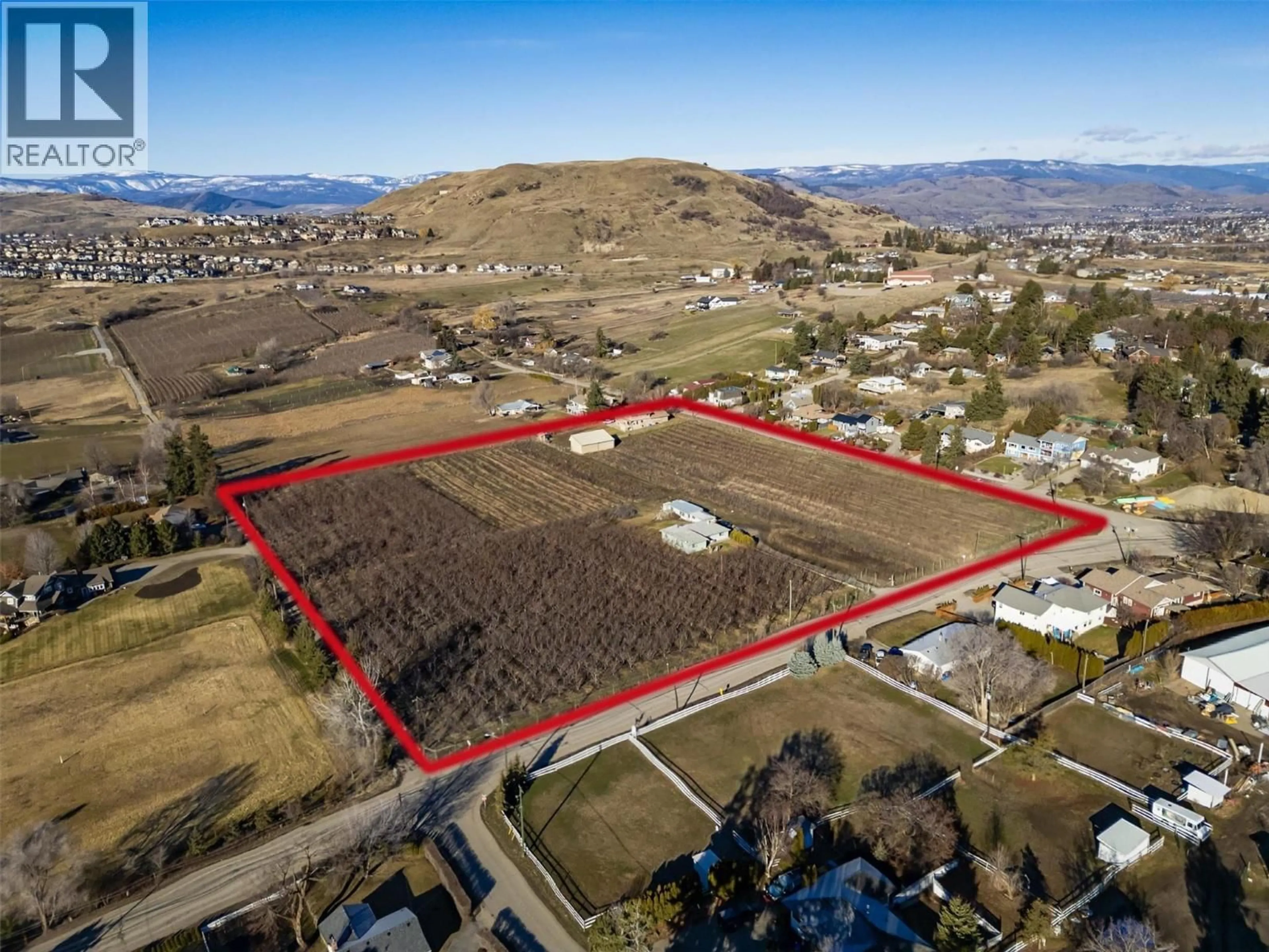 A pic from outside/outdoor area/front of a property/back of a property/a pic from drone, mountain view for 9810 VENABLES DRIVE, Coldstream British Columbia V1B2J9