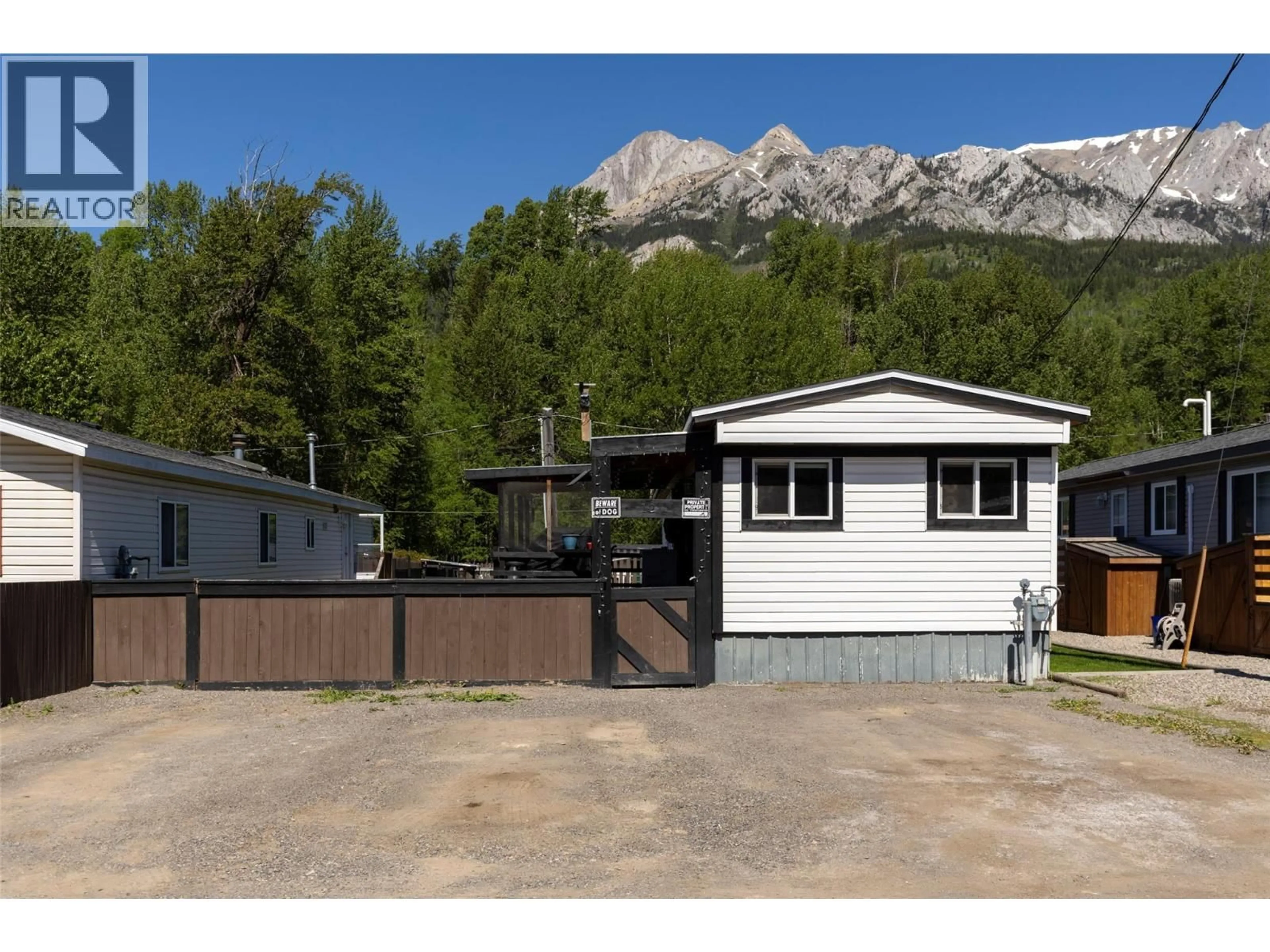 Home with vinyl exterior material, mountain view for 12 - 2011 3 HIGHWAY, Fernie British Columbia V0B1M5