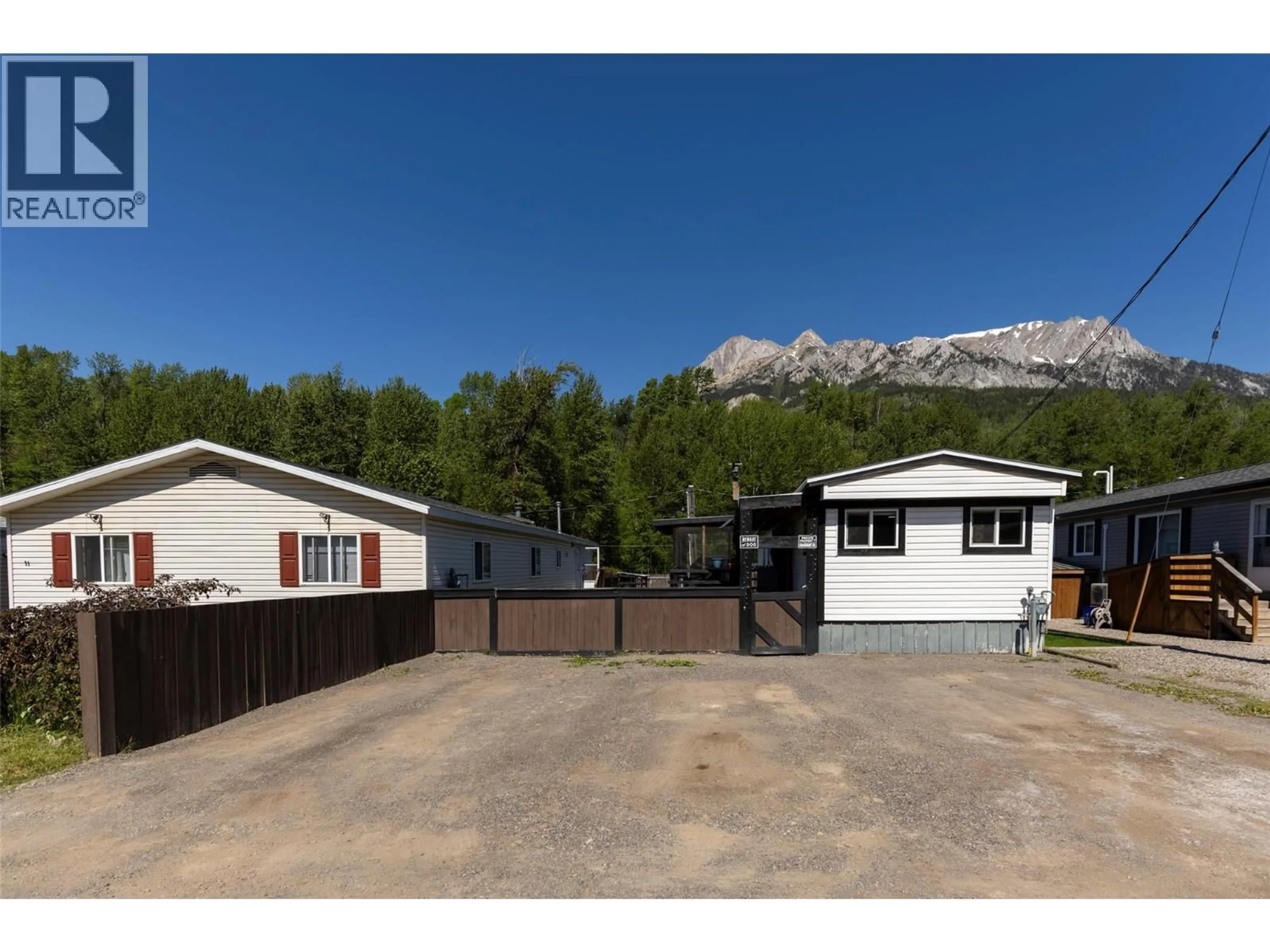 A pic from outside/outdoor area/front of a property/back of a property/a pic from drone, mountain view for 12 - 2011 3 HIGHWAY, Fernie British Columbia V0B1M5
