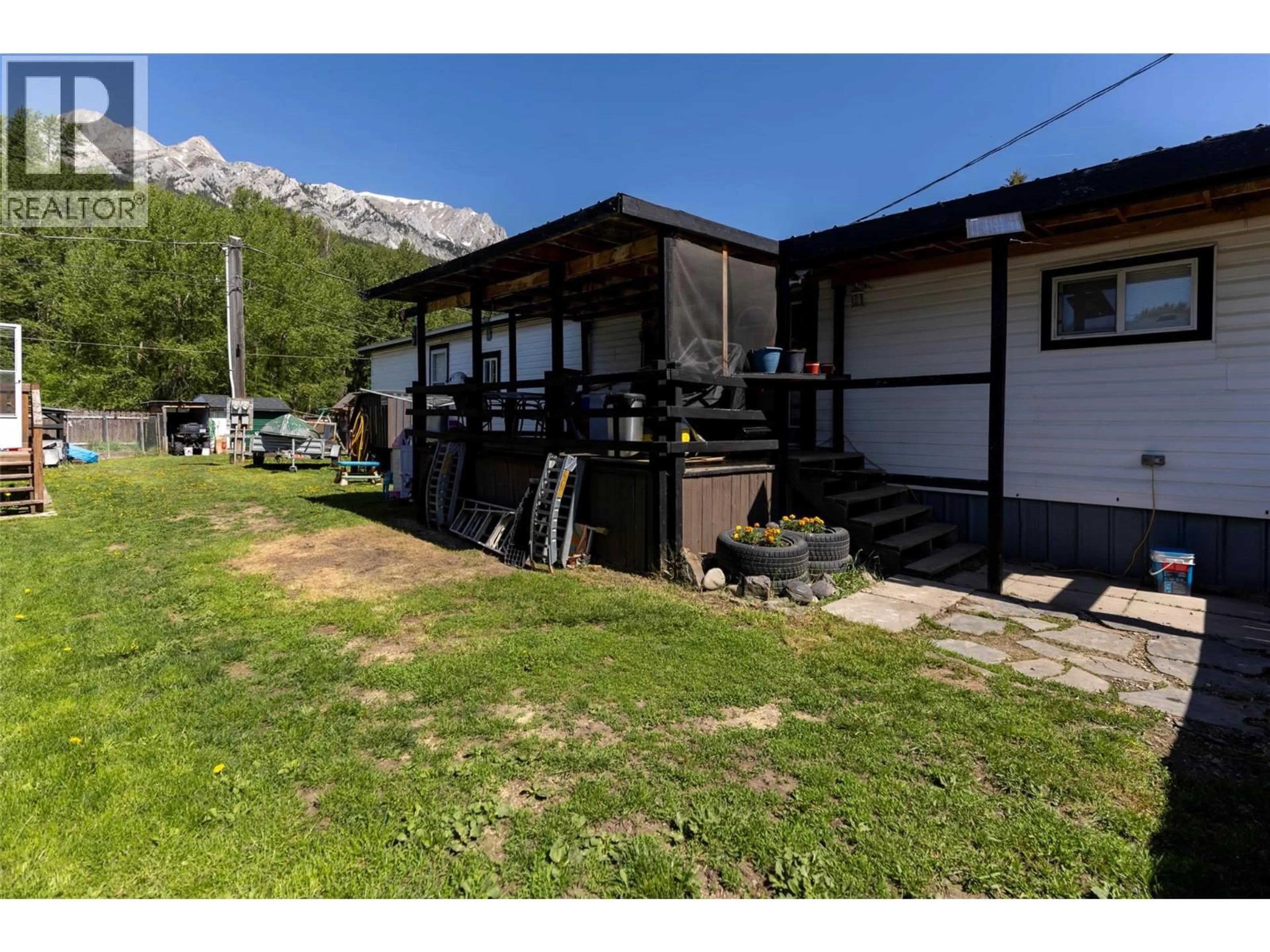 A pic from outside/outdoor area/front of a property/back of a property/a pic from drone, mountain view for 12 - 2011 3 HIGHWAY, Fernie British Columbia V0B1M5