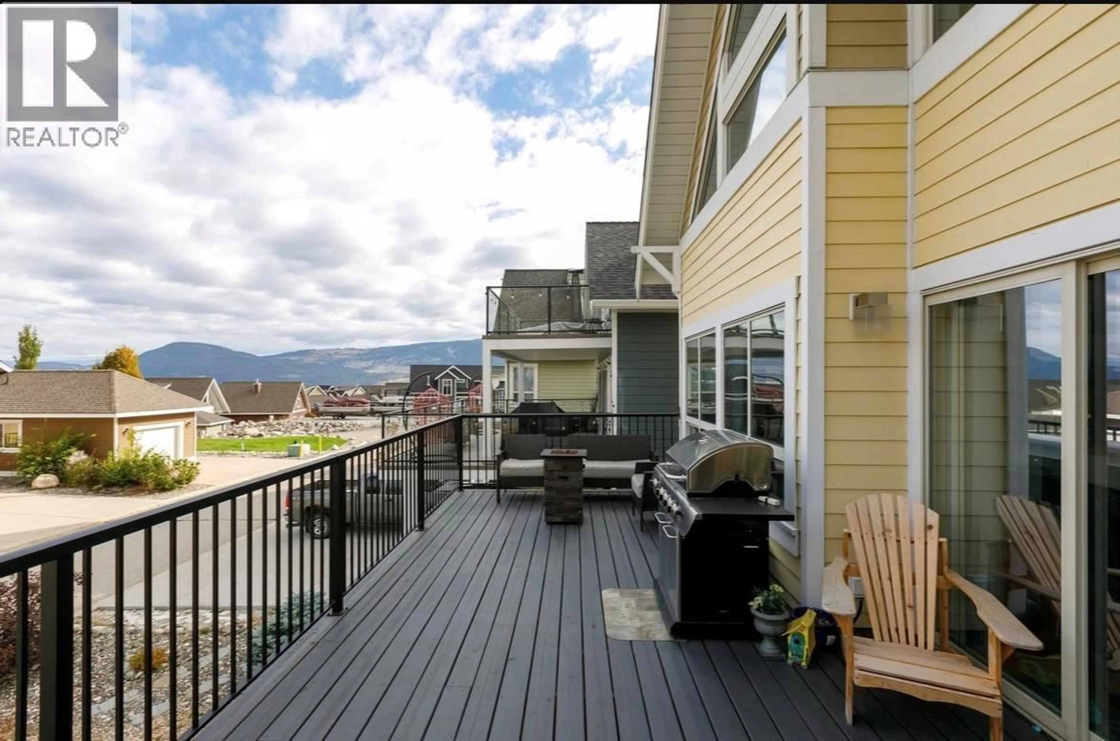 Patio, mountain view for 310 - 6822 MADRID WAY, Kelowna British Columbia V1Z3R8