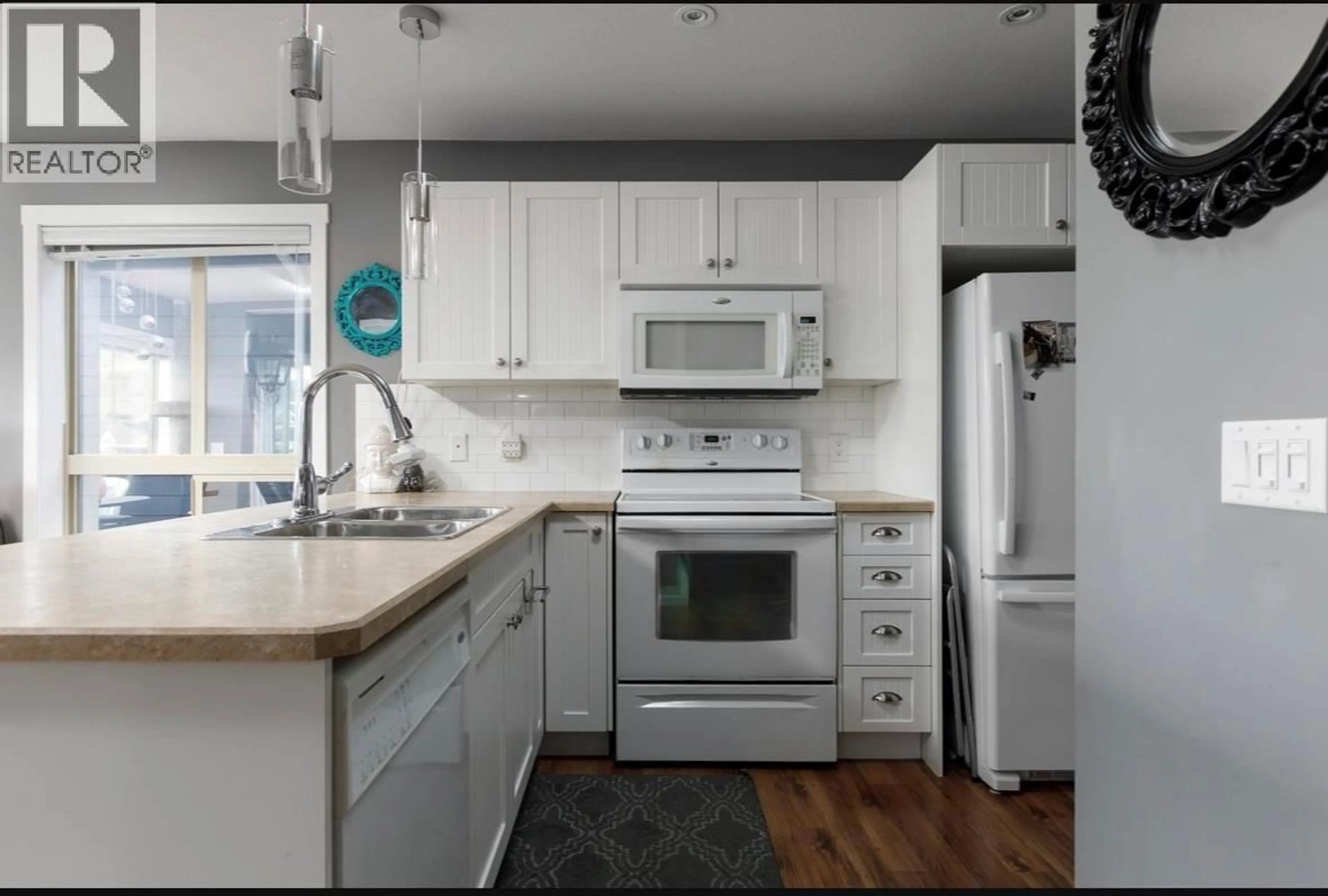 Standard kitchen, unknown for 310 - 6822 MADRID WAY, Kelowna British Columbia V1Z3R8