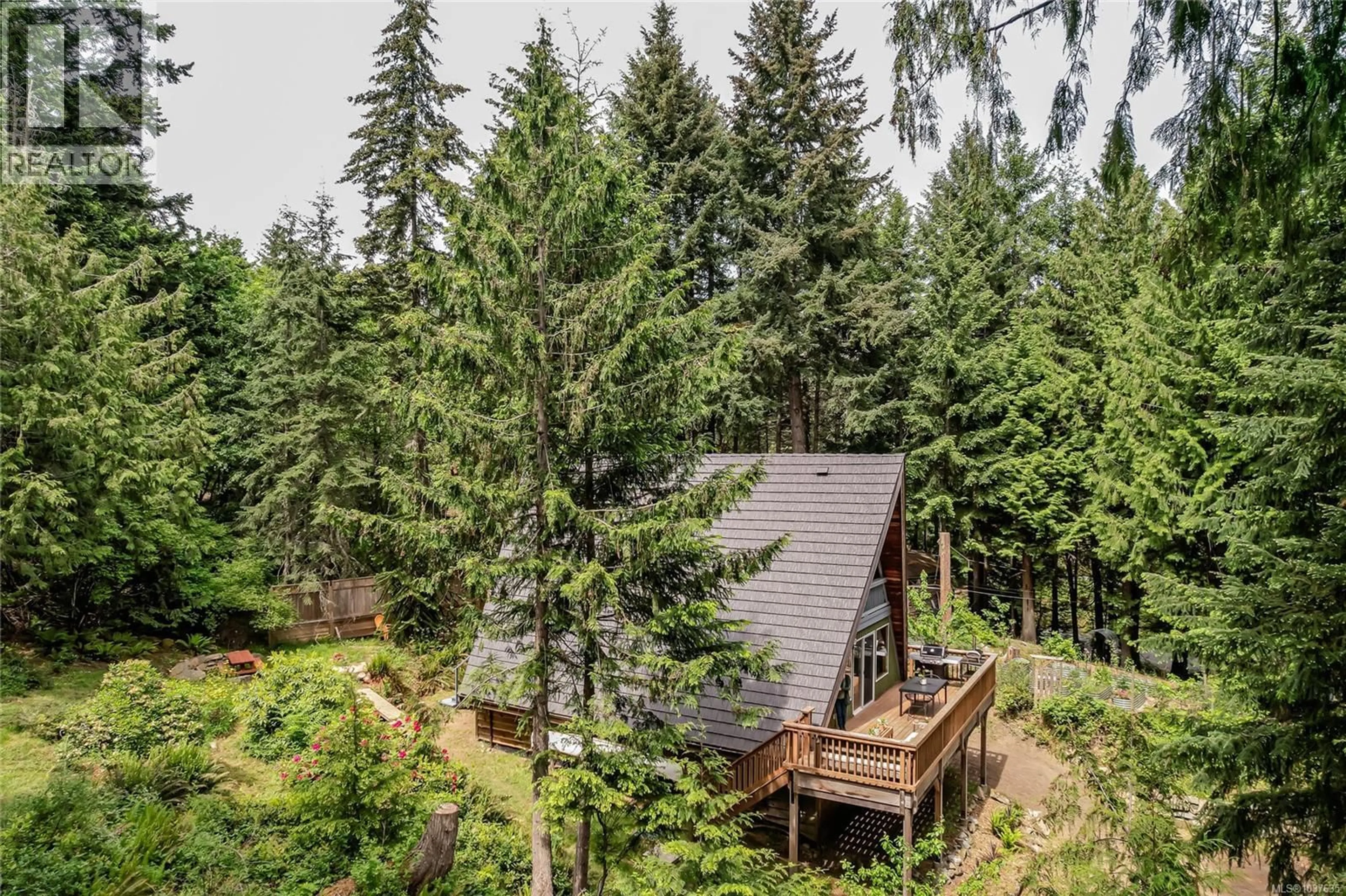 A pic from outside/outdoor area/front of a property/back of a property/a pic from drone, forest/trees view for 421 MT. BELCHER HEIGHTS, Salt Spring British Columbia V8K2J5