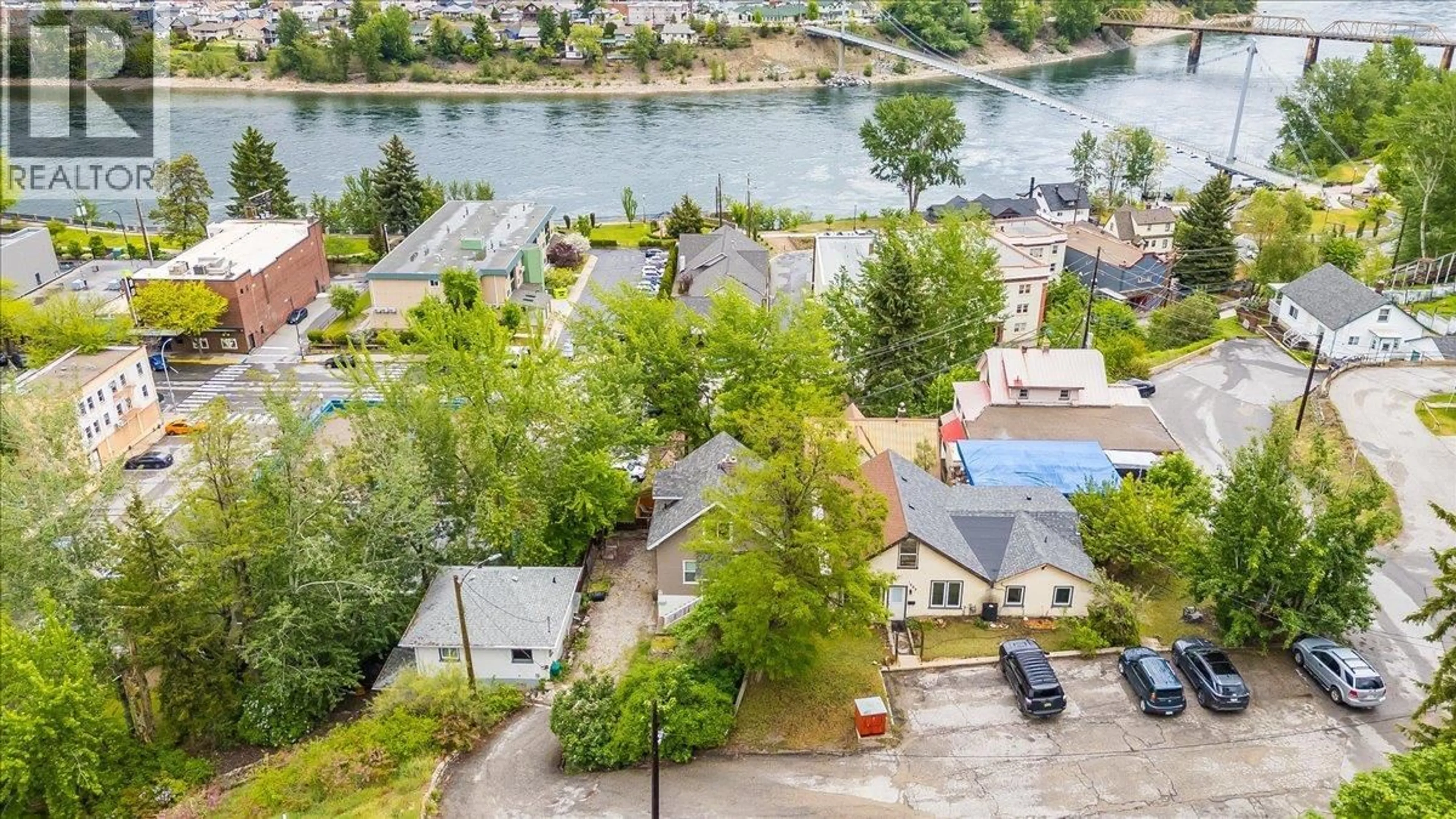 A pic from outside/outdoor area/front of a property/back of a property/a pic from drone, water/lake/river/ocean view for 1667 CEDAR AVENUE, Trail British Columbia V1R4C9