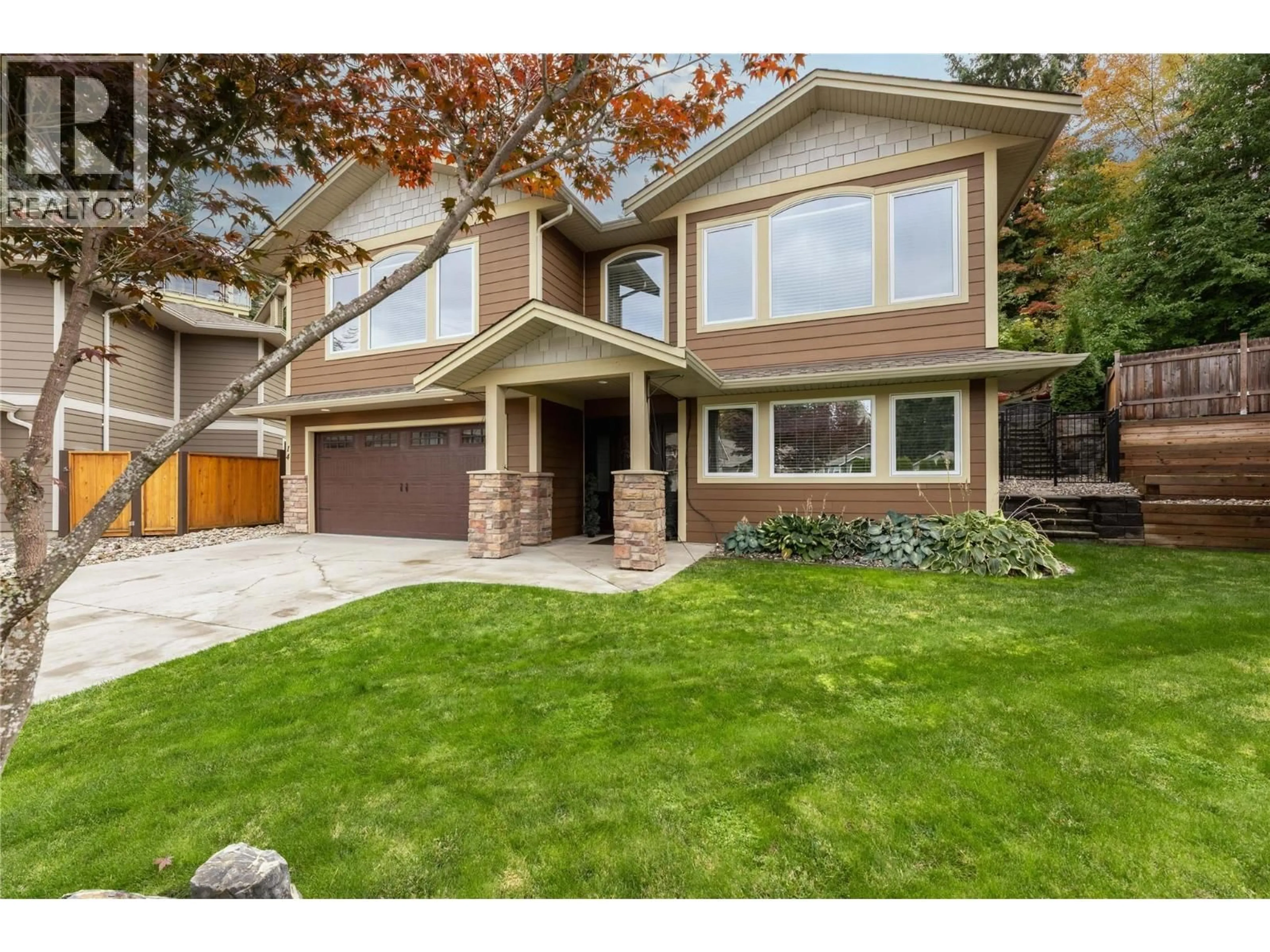Home with brick exterior material, street for 14 - 1581 20 STREET NORTHEAST, Salmon Arm British Columbia V1E0A7