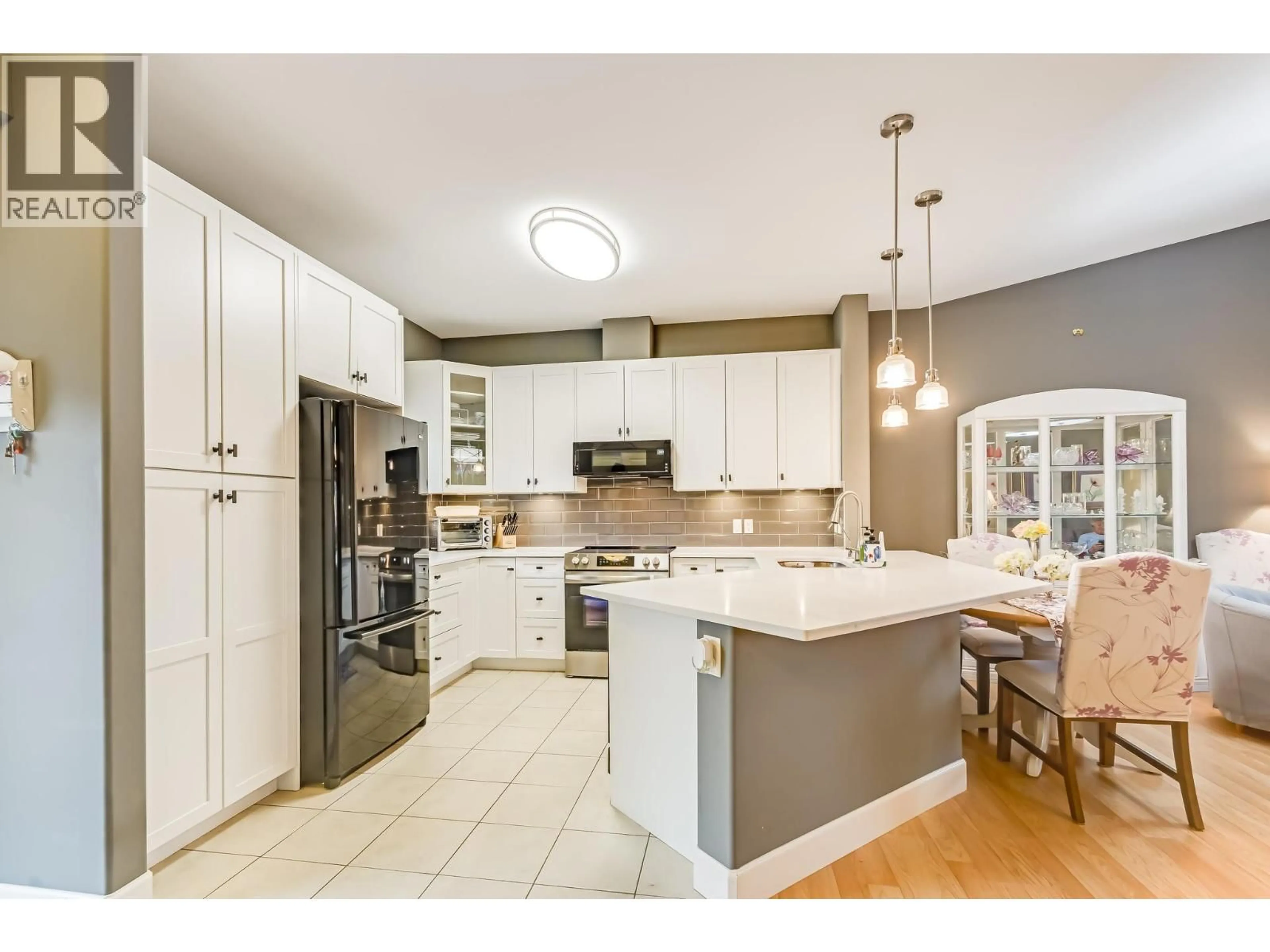 Open concept kitchen, ceramic/tile floor for 331 - 3996 BEACH AVENUE, Peachland British Columbia V0H1X5