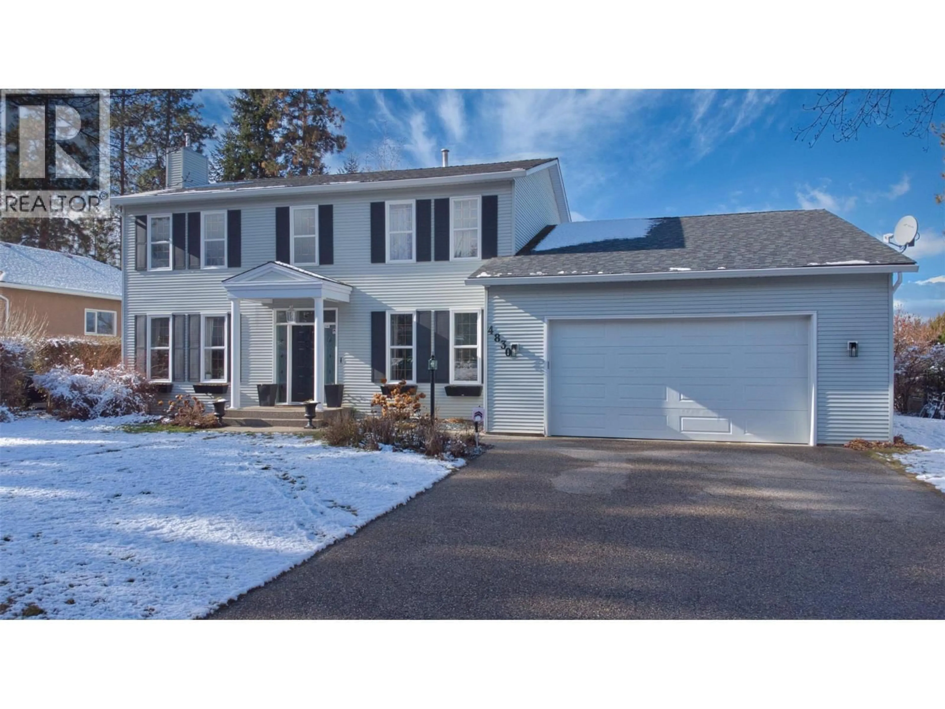 Home with vinyl exterior material, street for 4830 PARKRIDGE DRIVE, Kelowna British Columbia V1W3A1