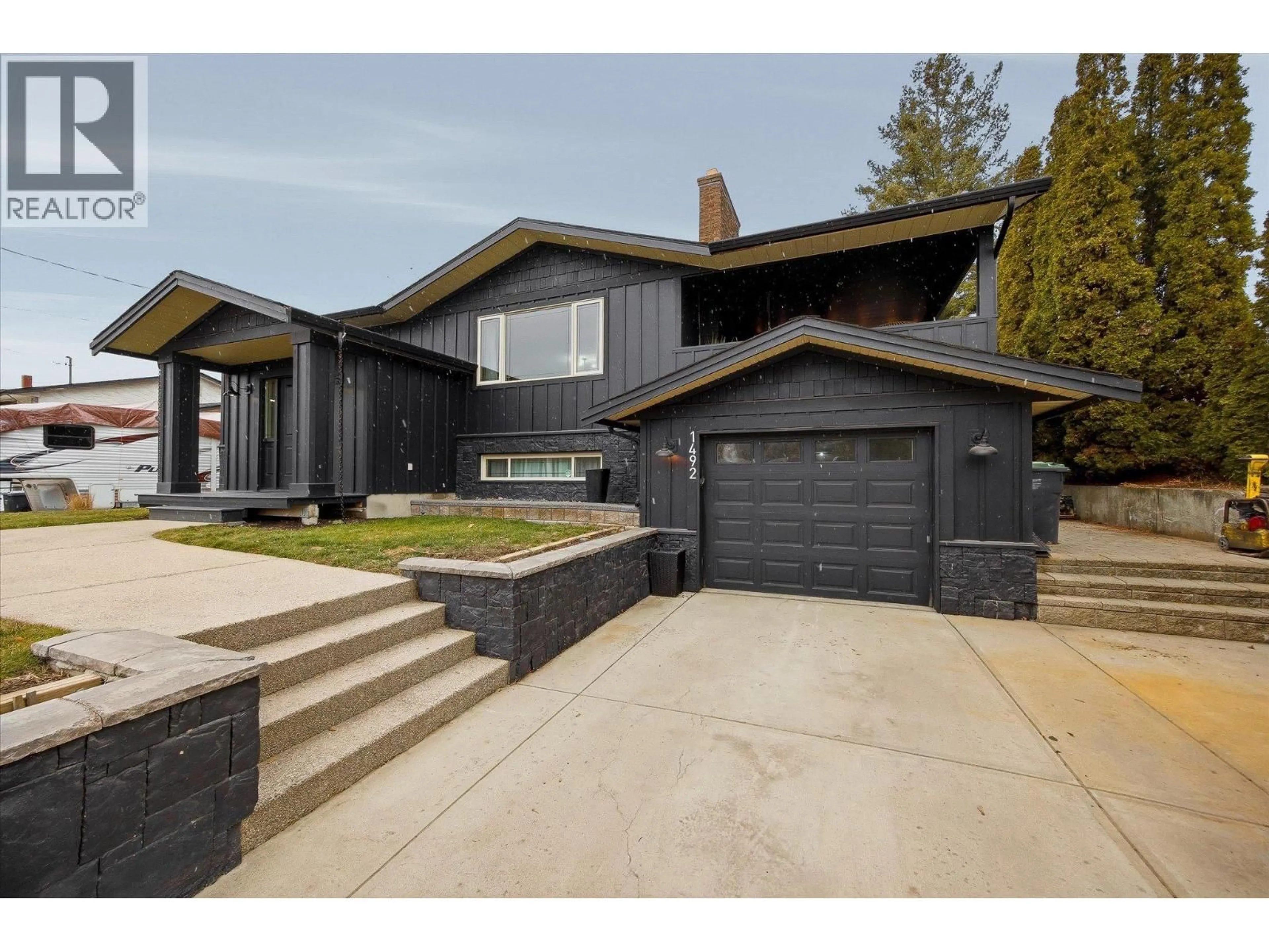 Home with brick exterior material, street for 1492 FOREST AVENUE, Kelowna British Columbia V1P1E7