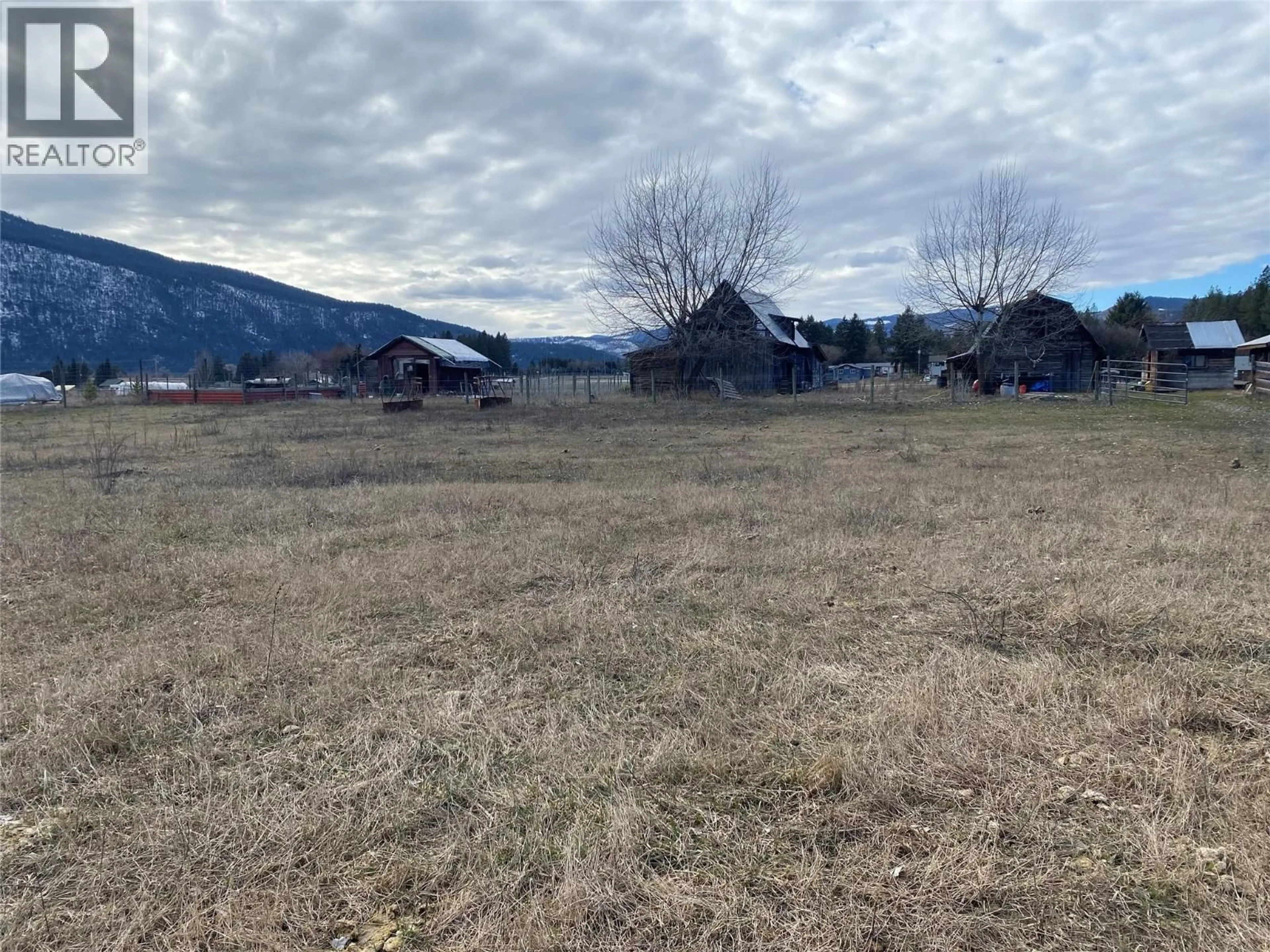 A pic from outside/outdoor area/front of a property/back of a property/a pic from drone, mountain view for 5945 DARCY ROAD, Grand Forks British Columbia V0H1H4