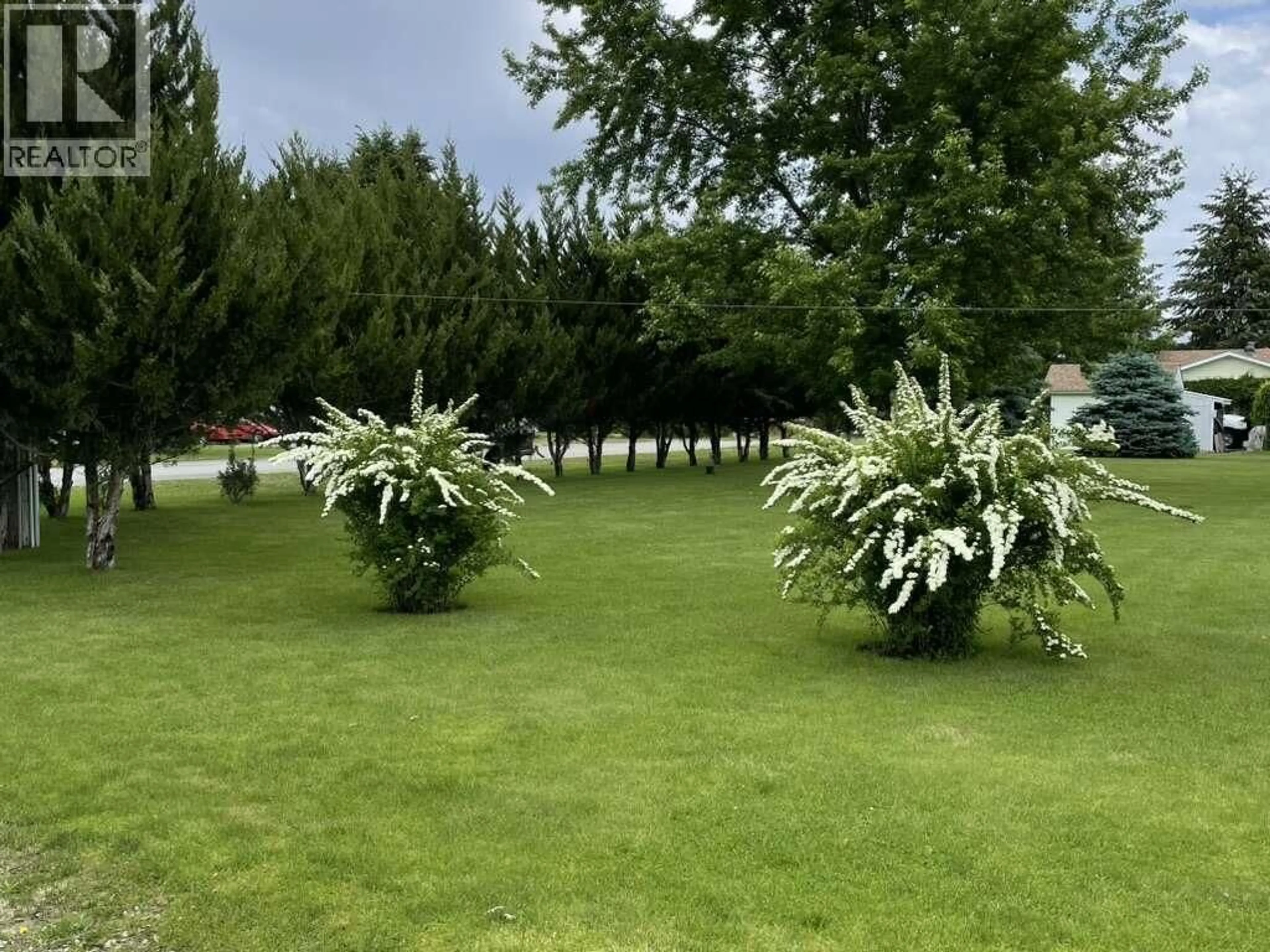 Patio, forest/trees view for 4980 VERNON STREET, Grand Forks British Columbia V0H1H5