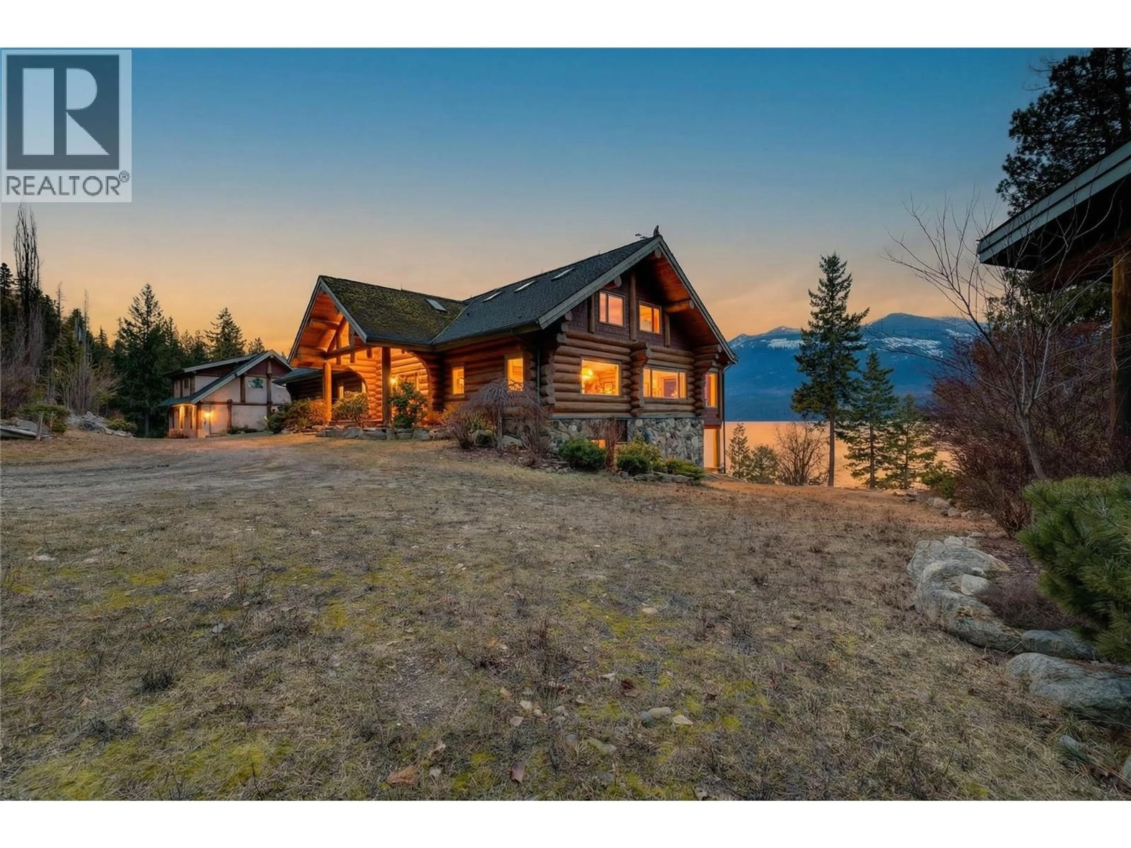 A pic from outside/outdoor area/front of a property/back of a property/a pic from drone, mountain view for 129 BOULDER BEACH ROAD, Kootenay Bay British Columbia V0B1X0