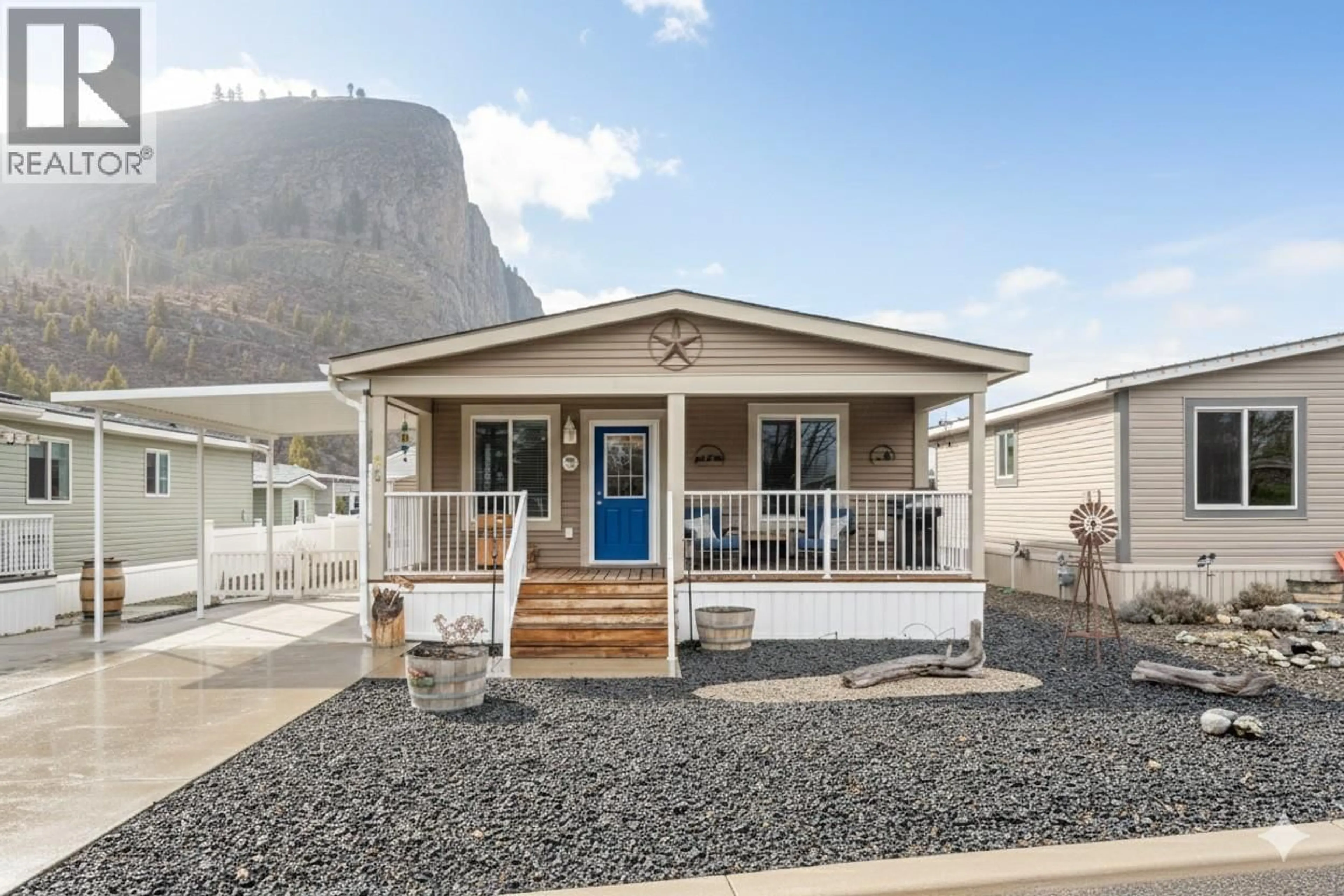 Home with vinyl exterior material, mountain view for 82 - 8598 97 HIGHWAY, Oliver British Columbia V0H1T2