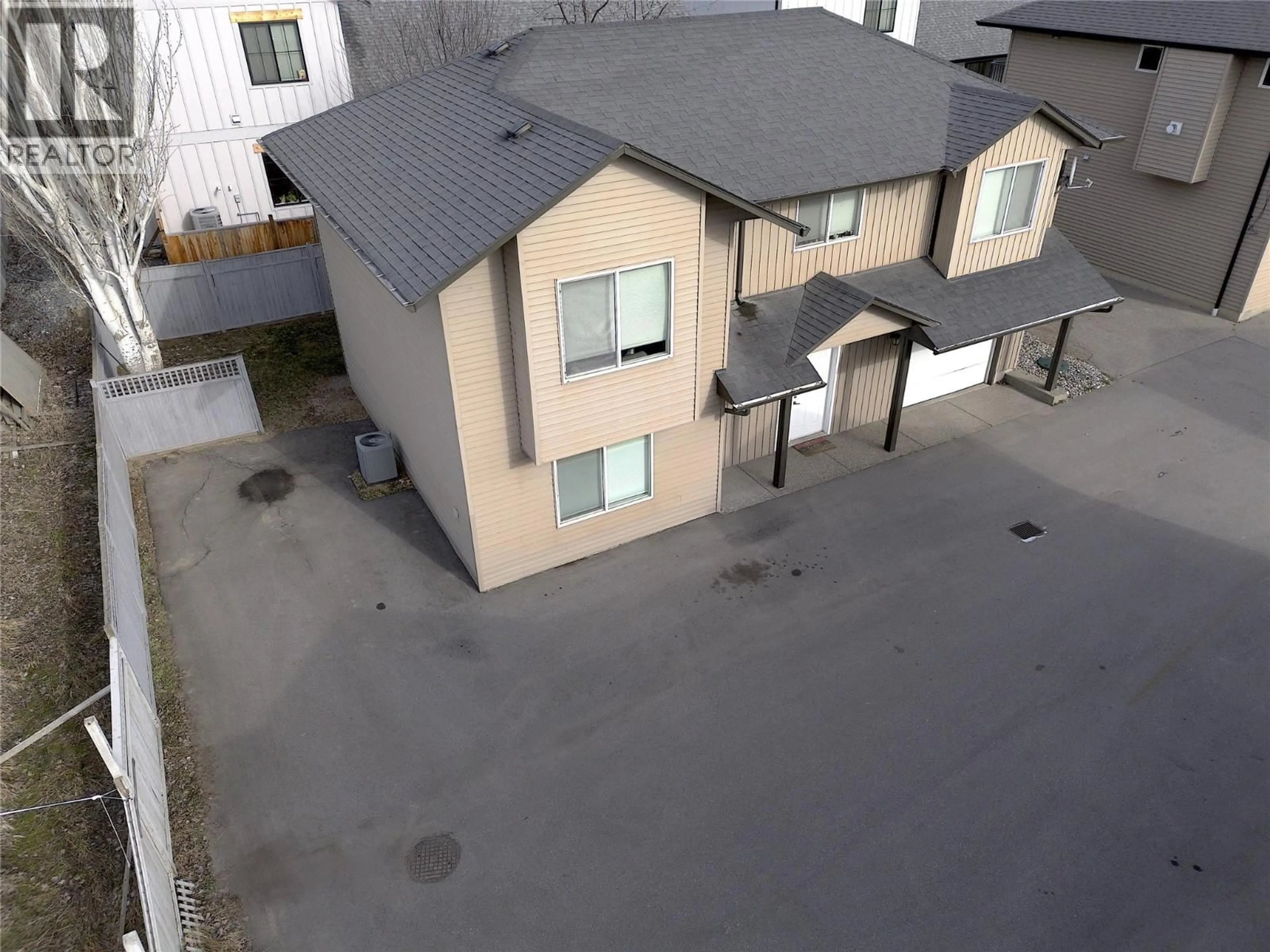 A pic from outside/outdoor area/front of a property/back of a property/a pic from drone, street for 4406A 25 STREET, Vernon British Columbia V1T4S6