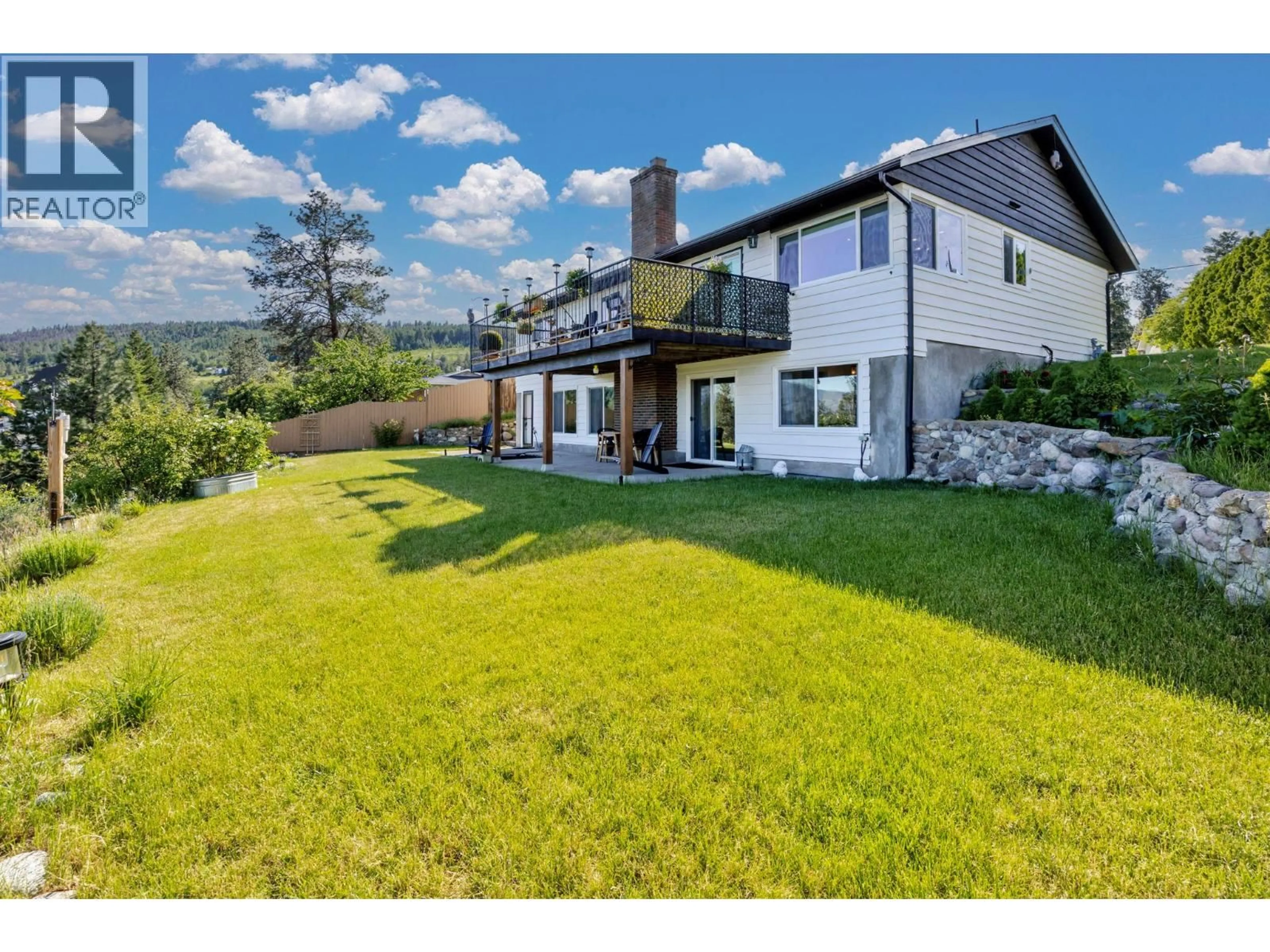 A pic from outside/outdoor area/front of a property/back of a property/a pic from drone, mountain view for 3371 MCMURCHIE ROAD, West Kelowna British Columbia V4T1B4