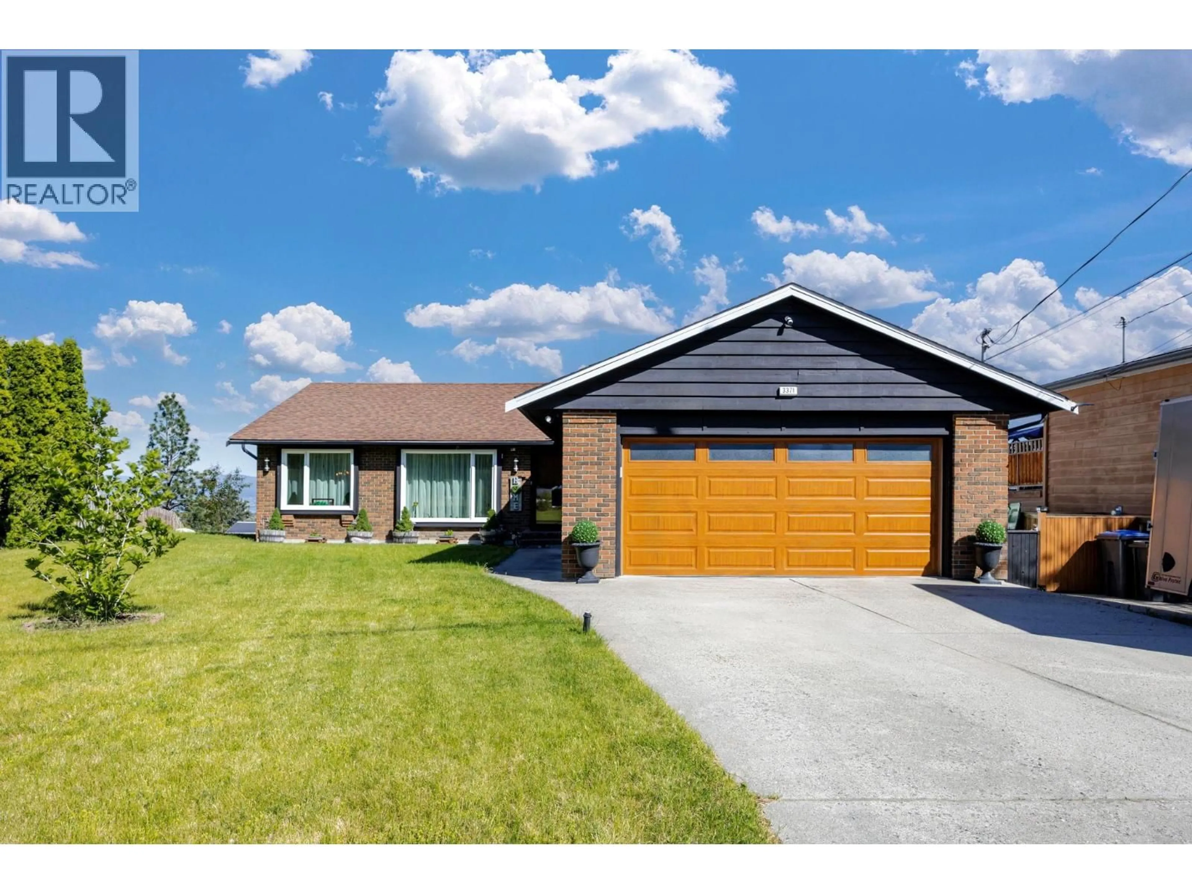 Home with brick exterior material, street for 3371 MCMURCHIE ROAD, West Kelowna British Columbia V4T1B4