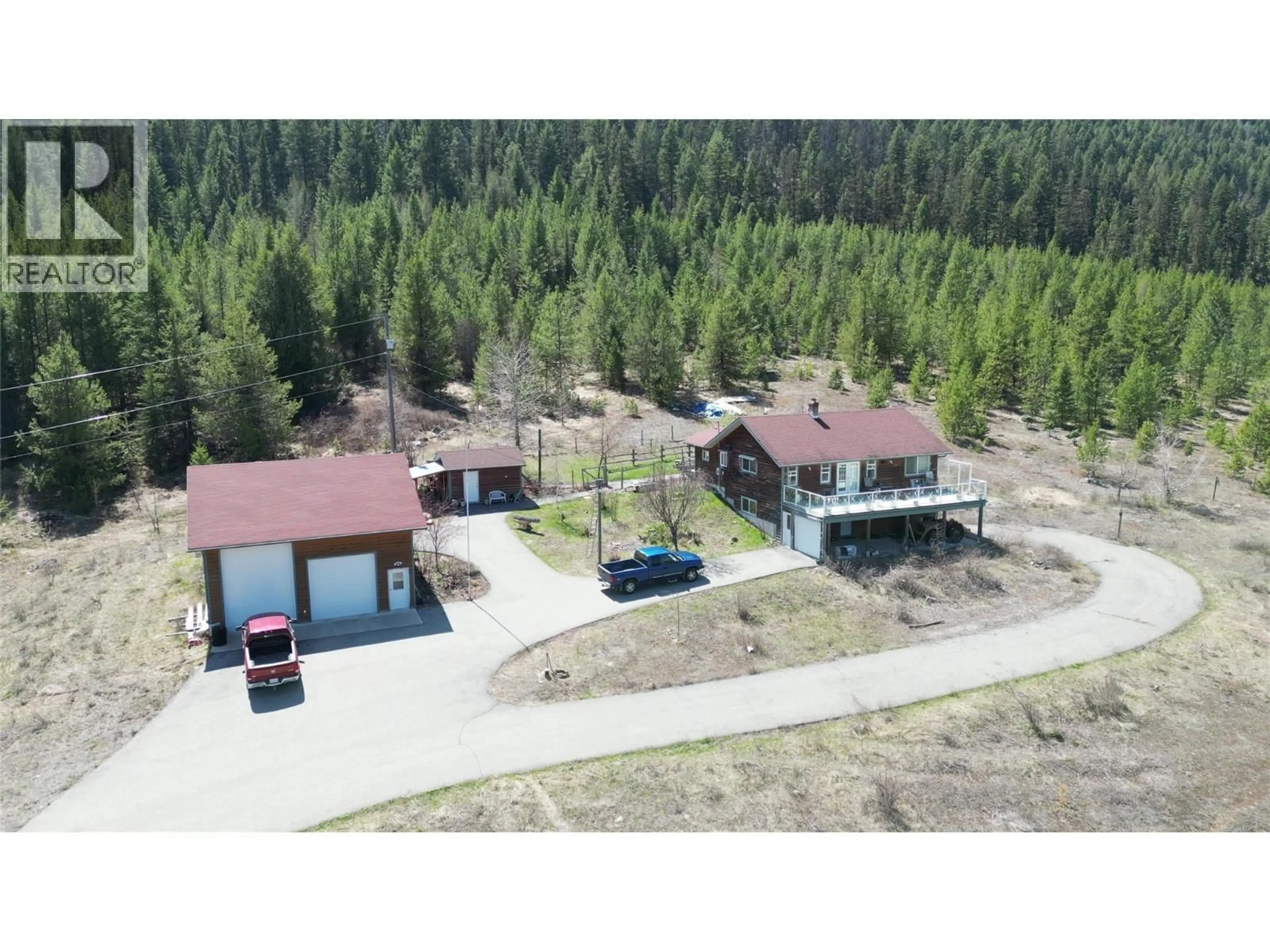 A pic from outside/outdoor area/front of a property/back of a property/a pic from drone, forest/trees view for 12165 HIGHWAY 3 HIGHWAY, Greenwood British Columbia V0H1J0