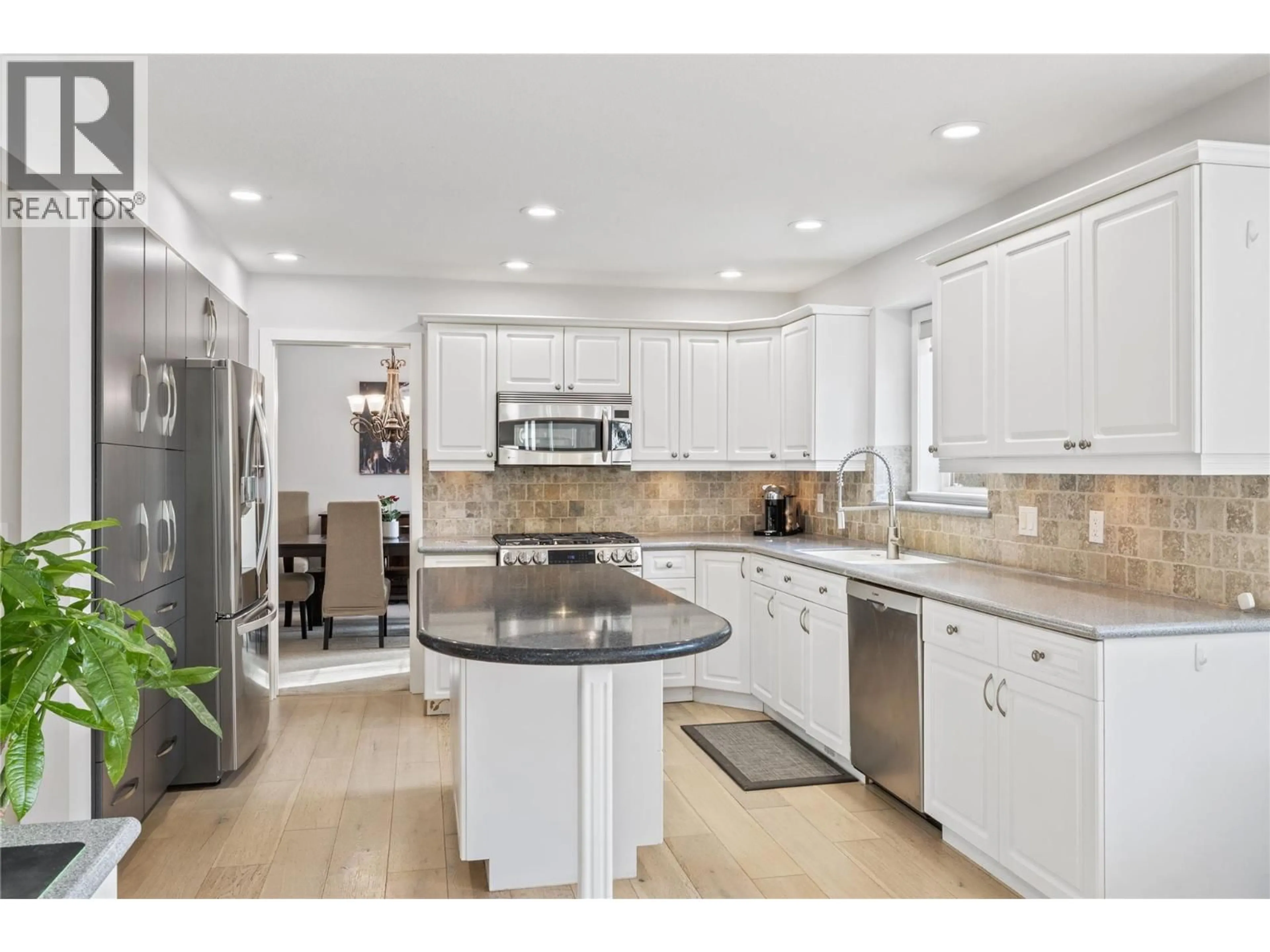 Open concept kitchen, ceramic/tile floor for 3947 LAKEVALE PLACE, Kelowna British Columbia V1W3Z5